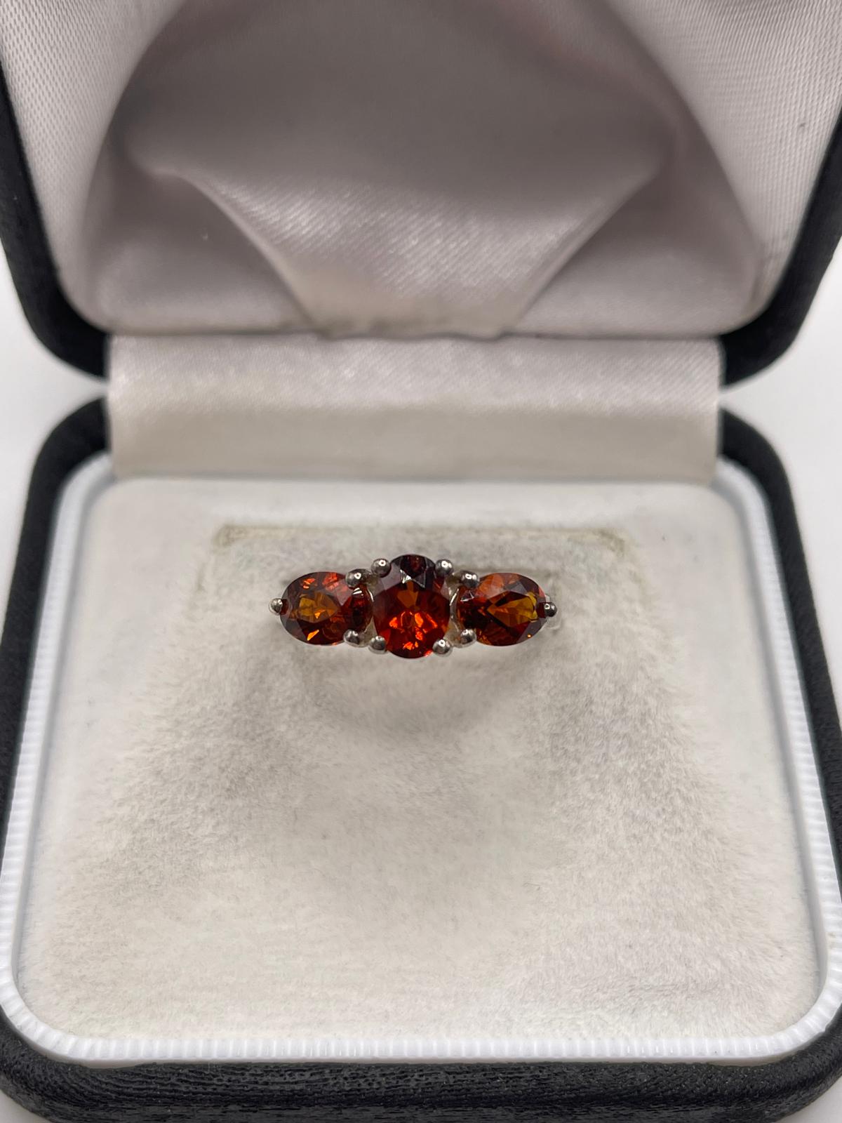Silver topaz ring