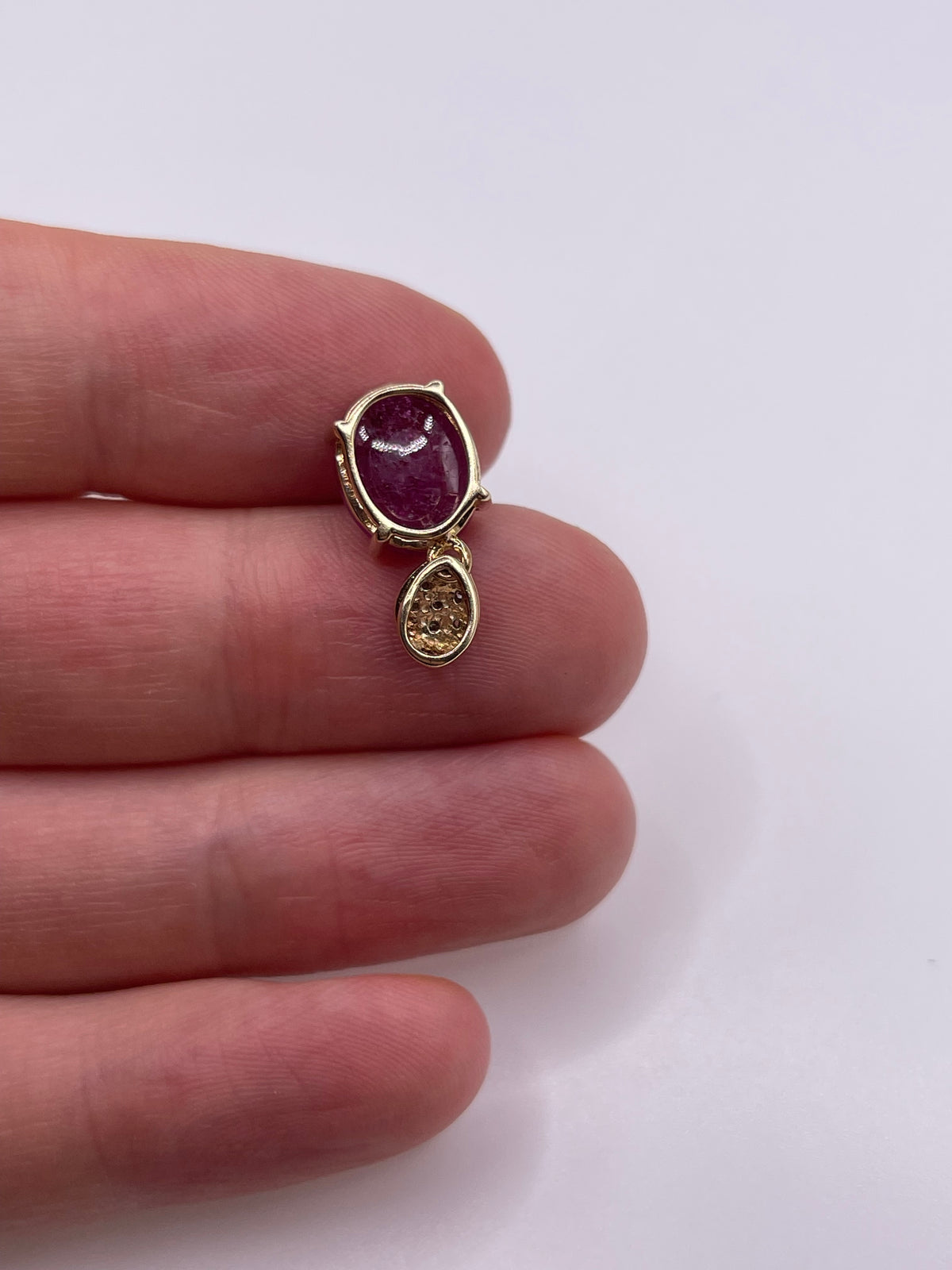 9ct gold cabochon ruby and diamond pendant