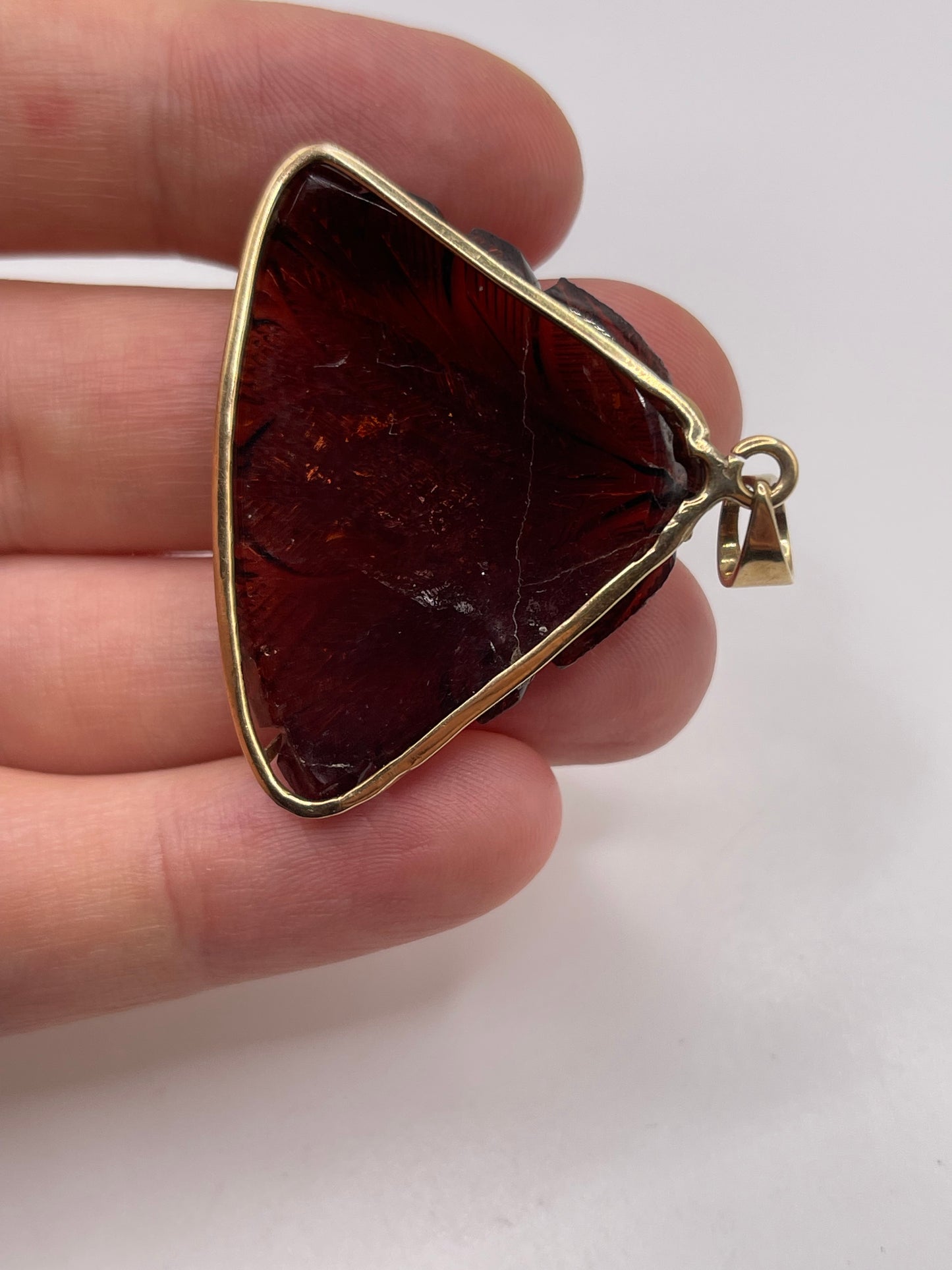 9ct gold carved tourmaline pendant