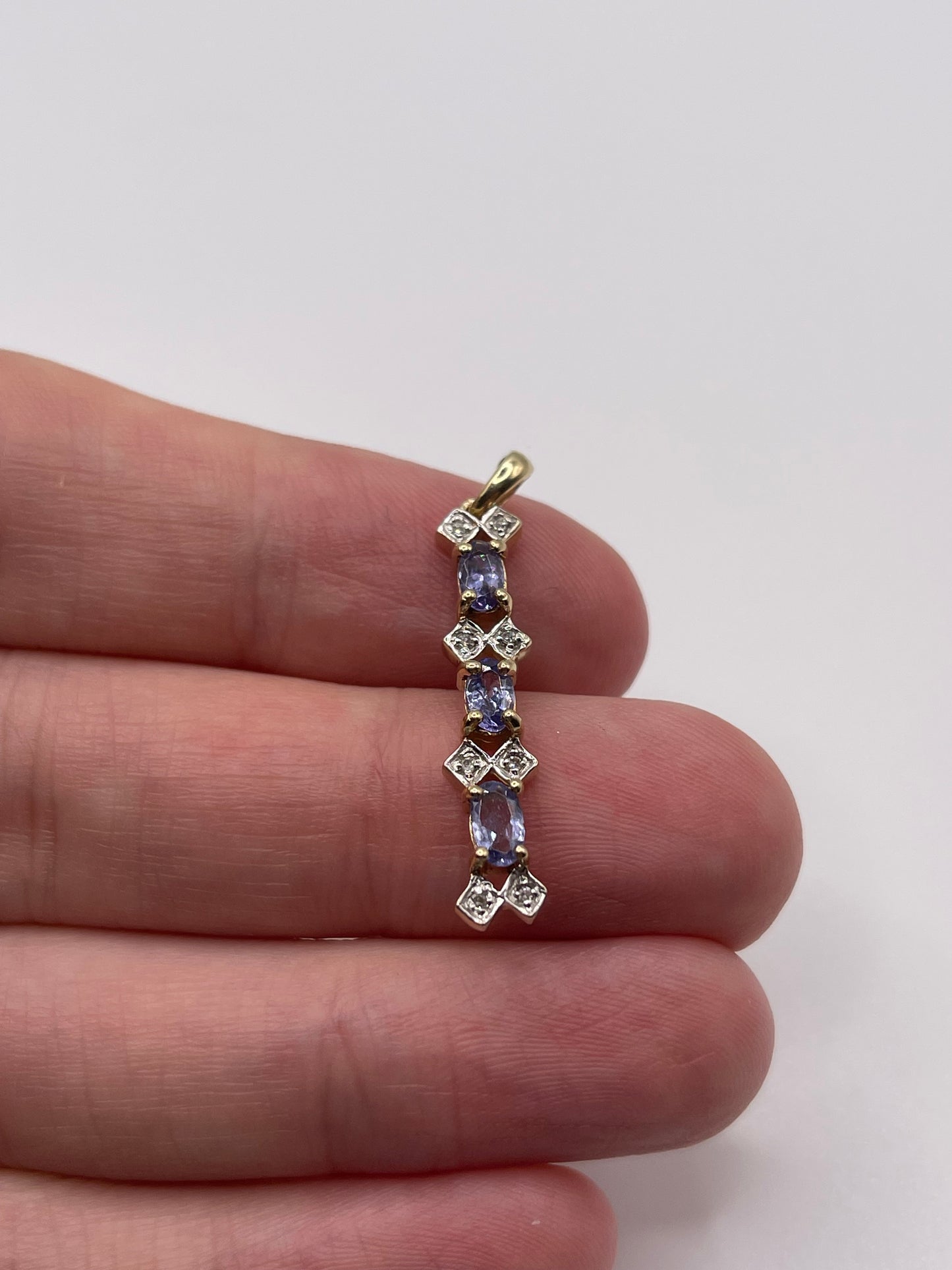 9ct gold tanzanite and diamond pendant