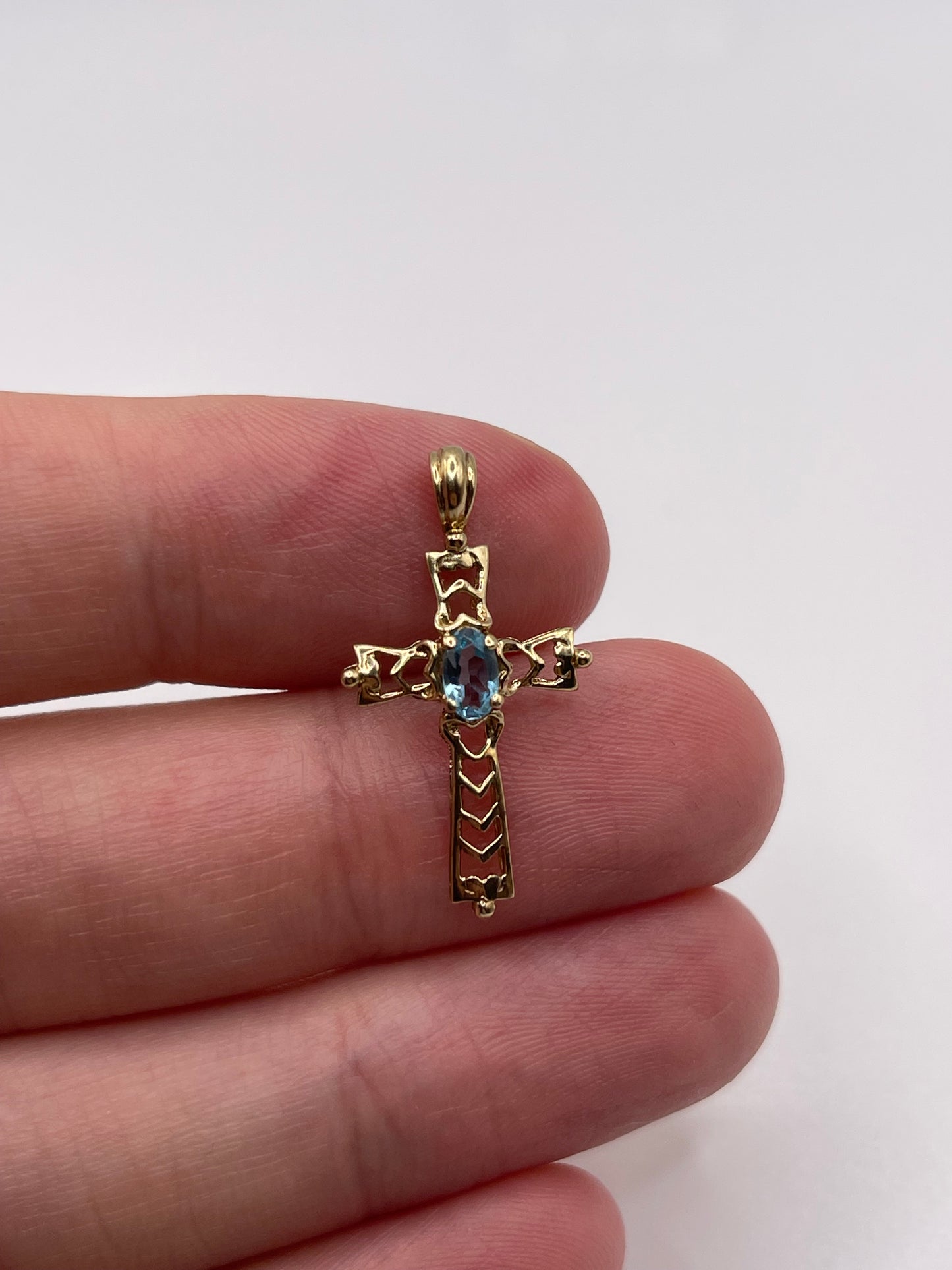9ct gold blue topaz cross pendant