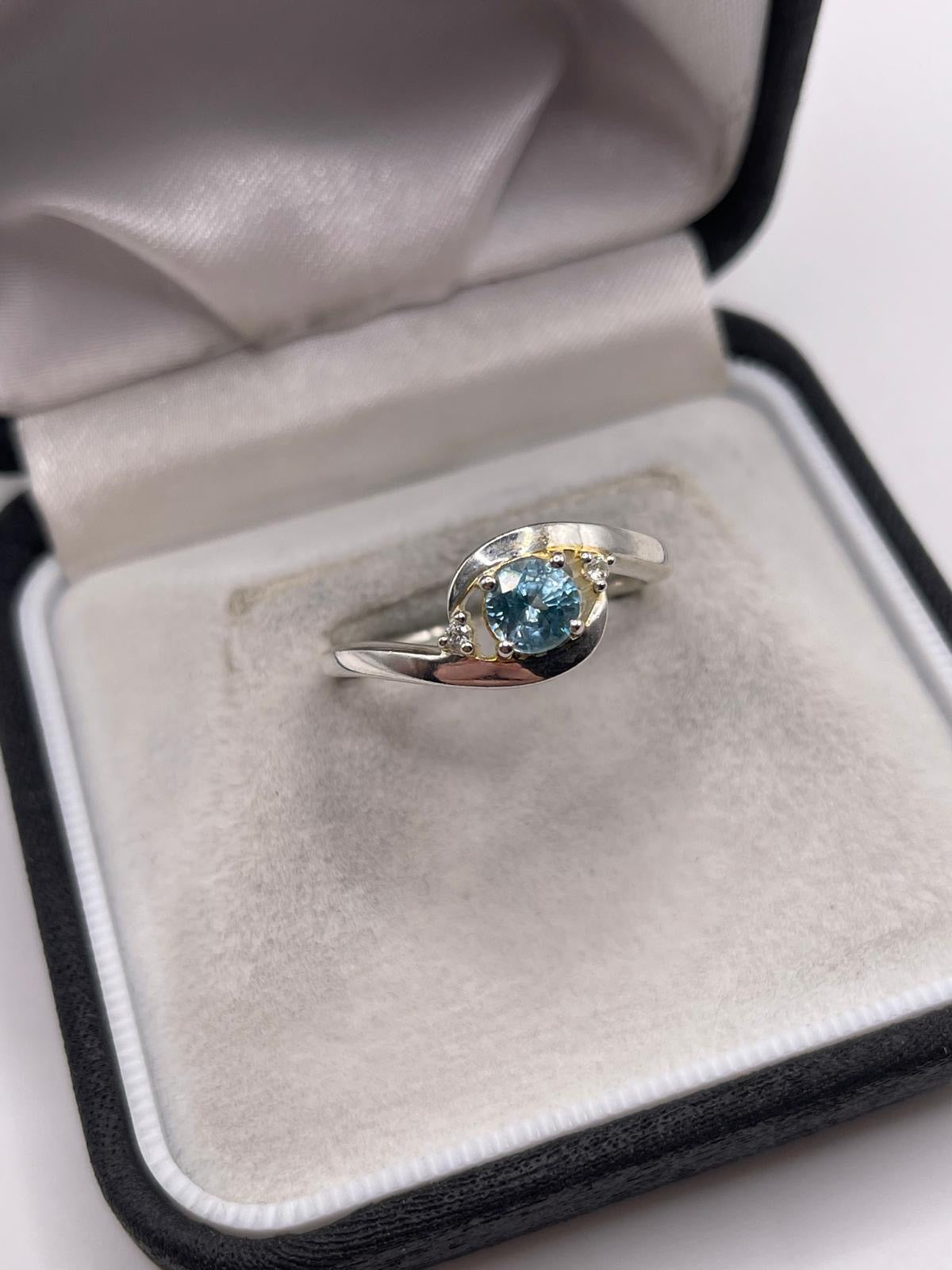 Silver topaz ring