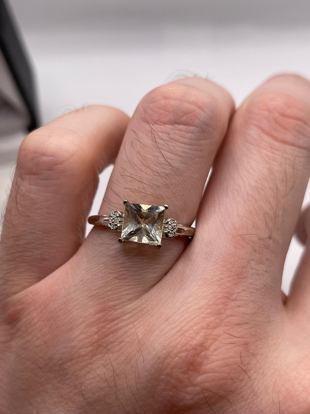 Silver topaz ring