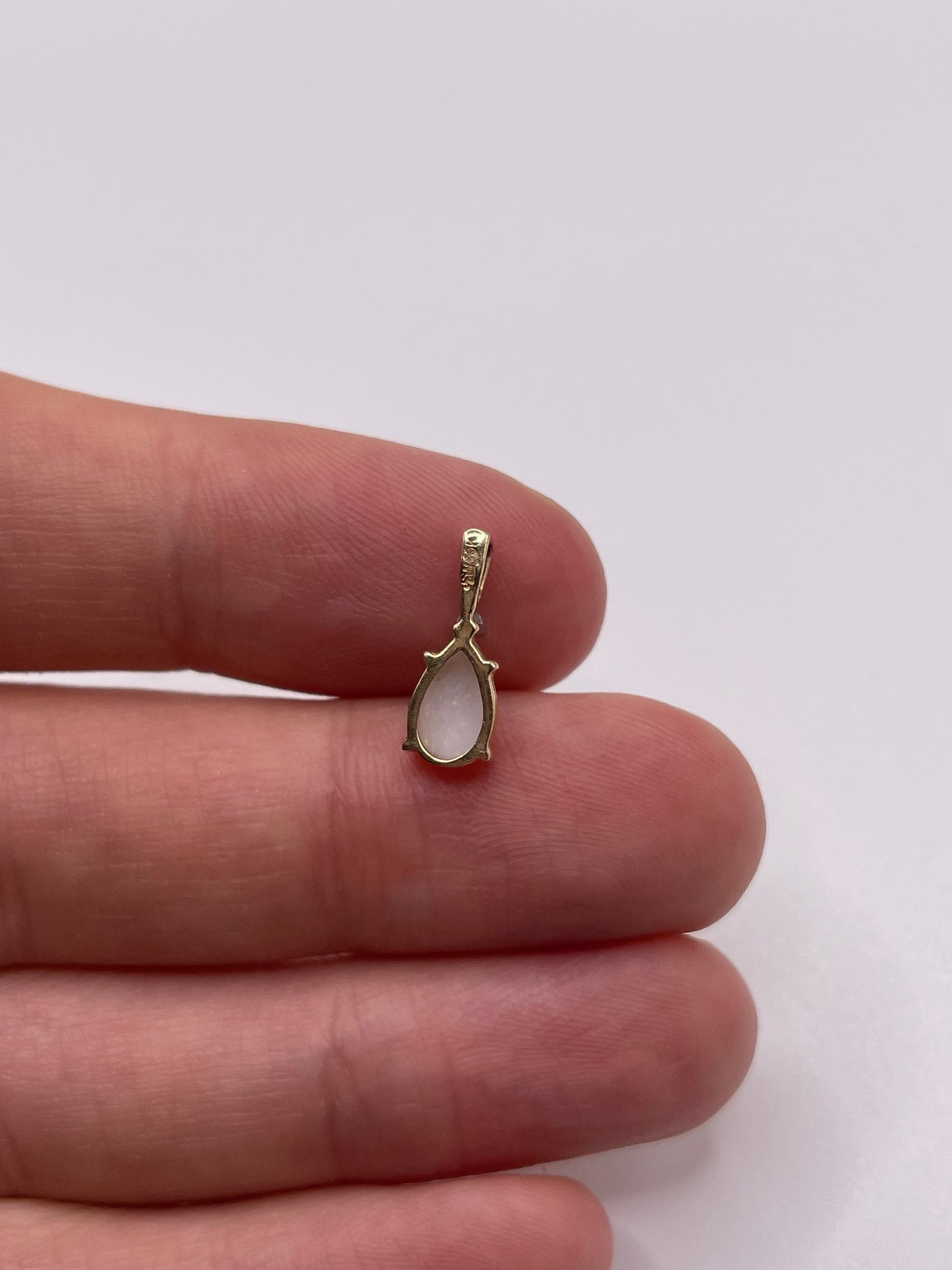 9ct gold opal and diamond pendant