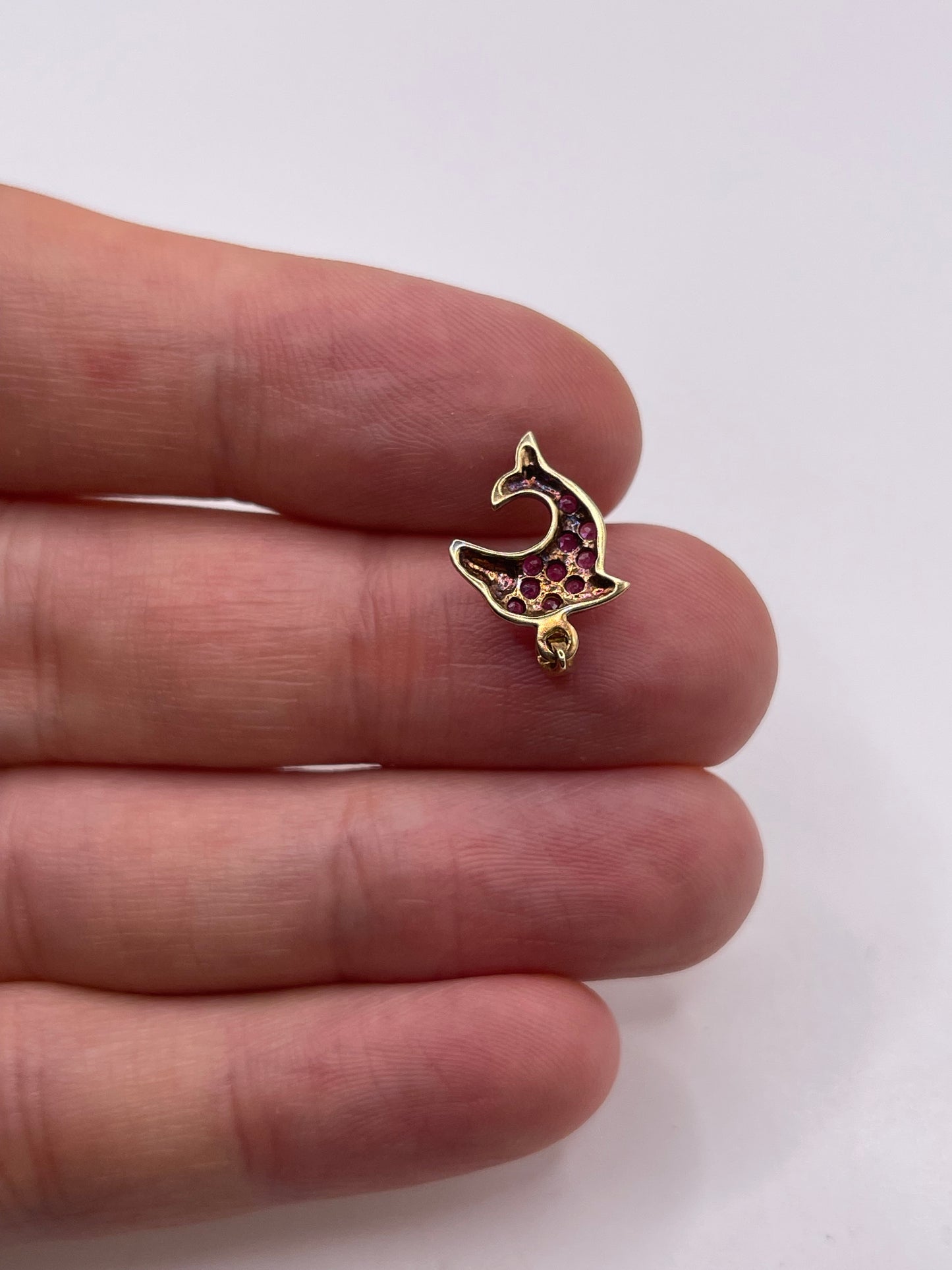 9ct gold ruby and diamond dolphin pendant