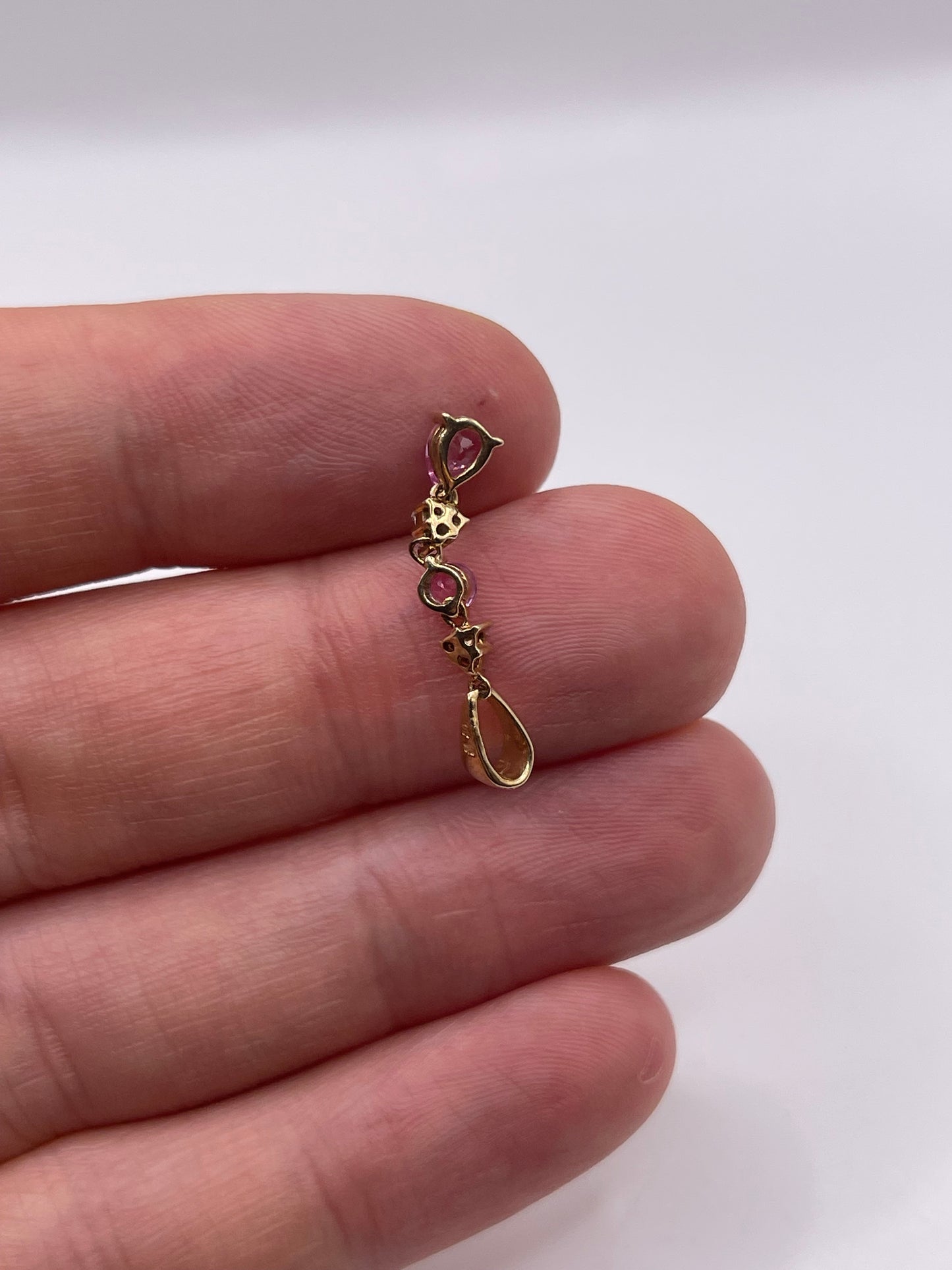 9ct gold pink sapphire and diamond pendant