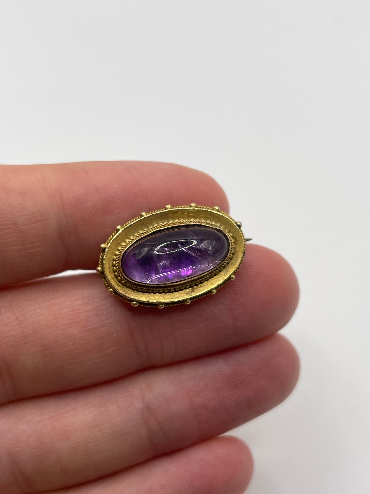 Antique 15ct gold cabochon amethyst brooch