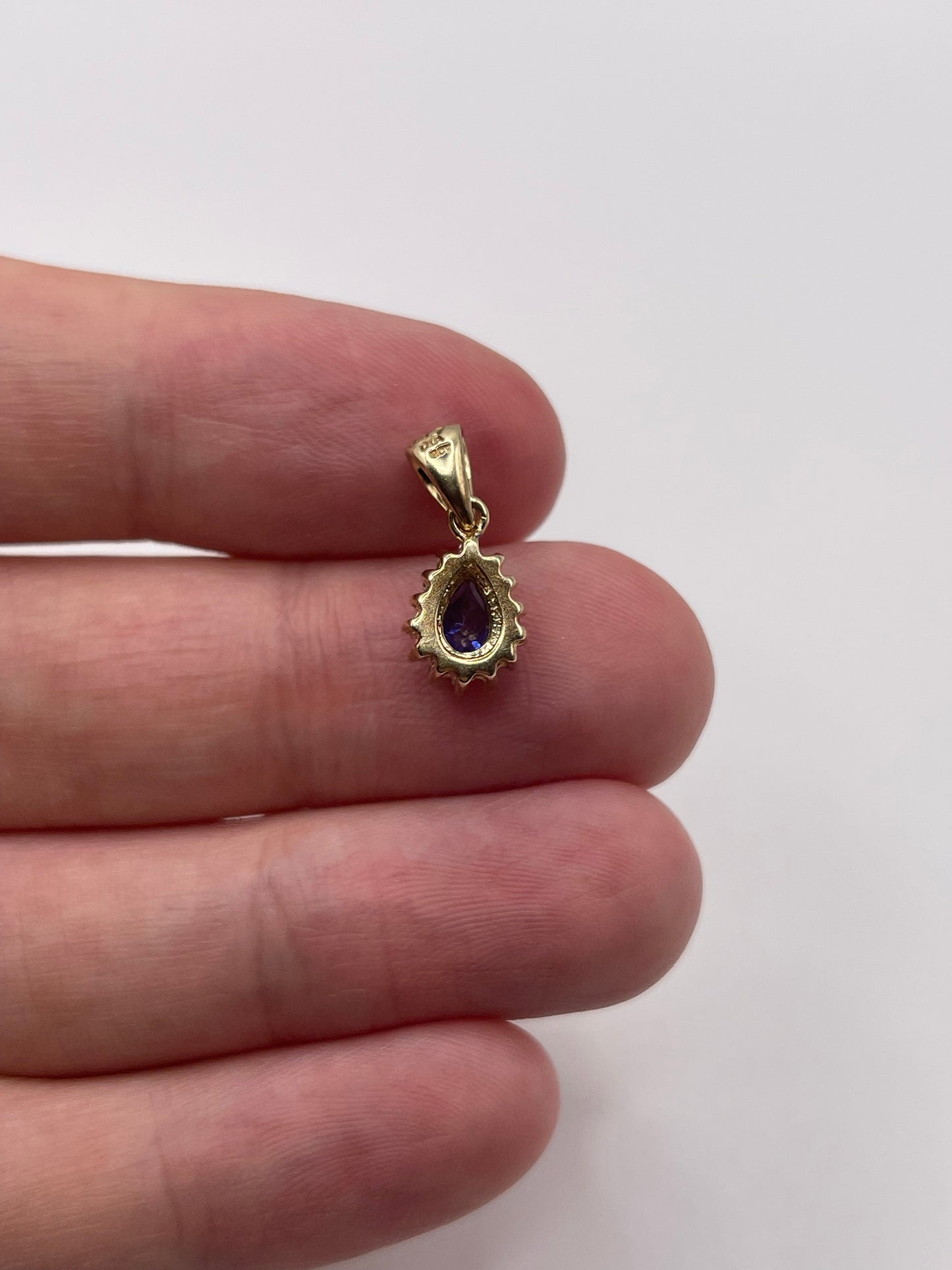 9ct gold iolite and diamond pendant