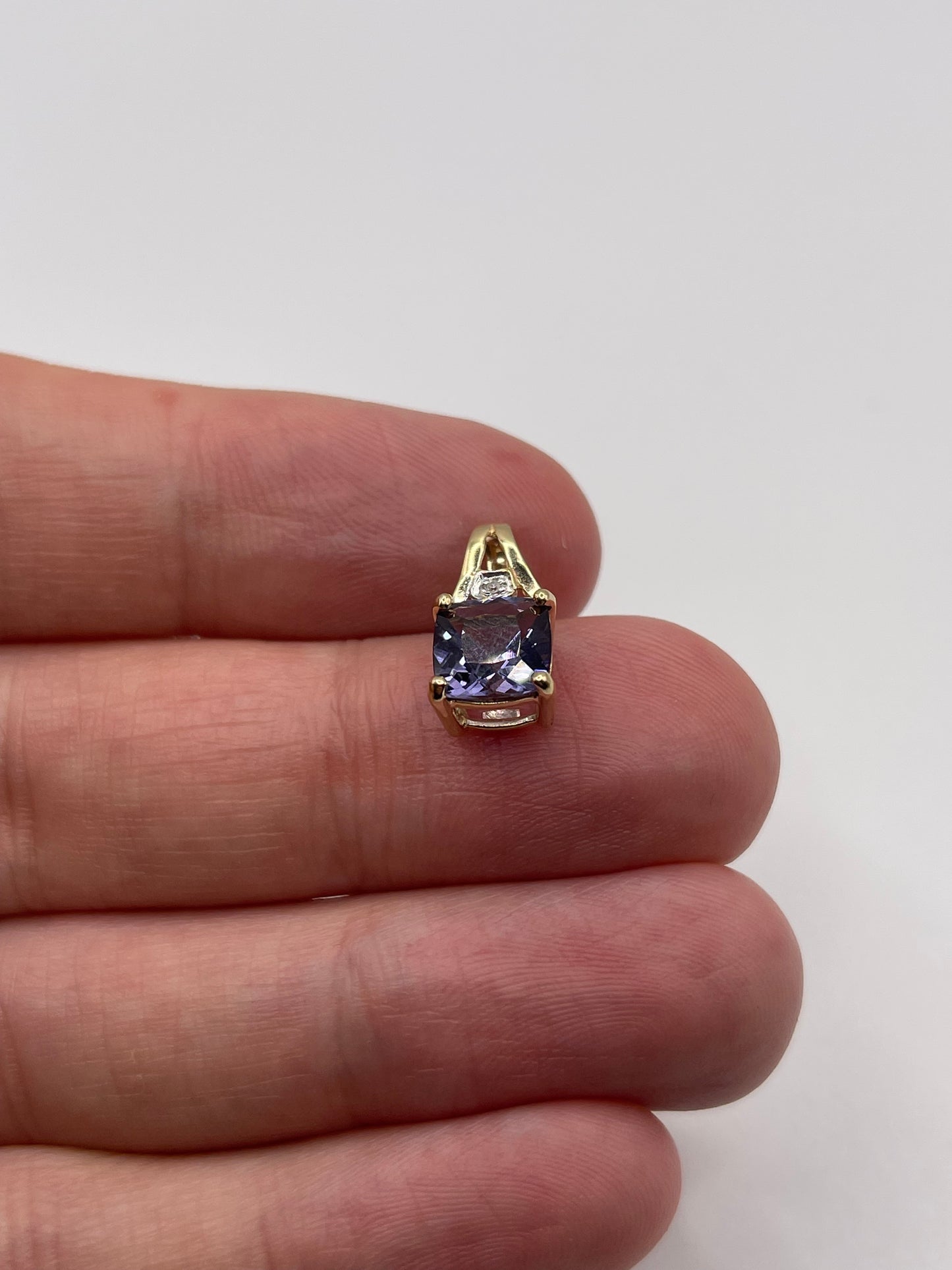9ct gold iolite and diamond pendant