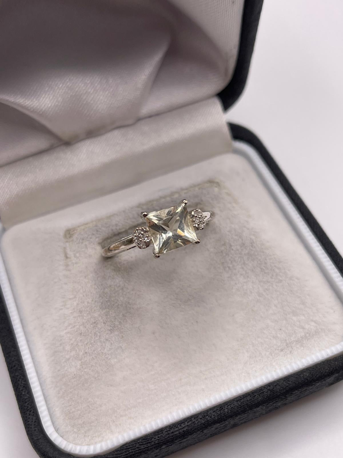 Silver topaz ring