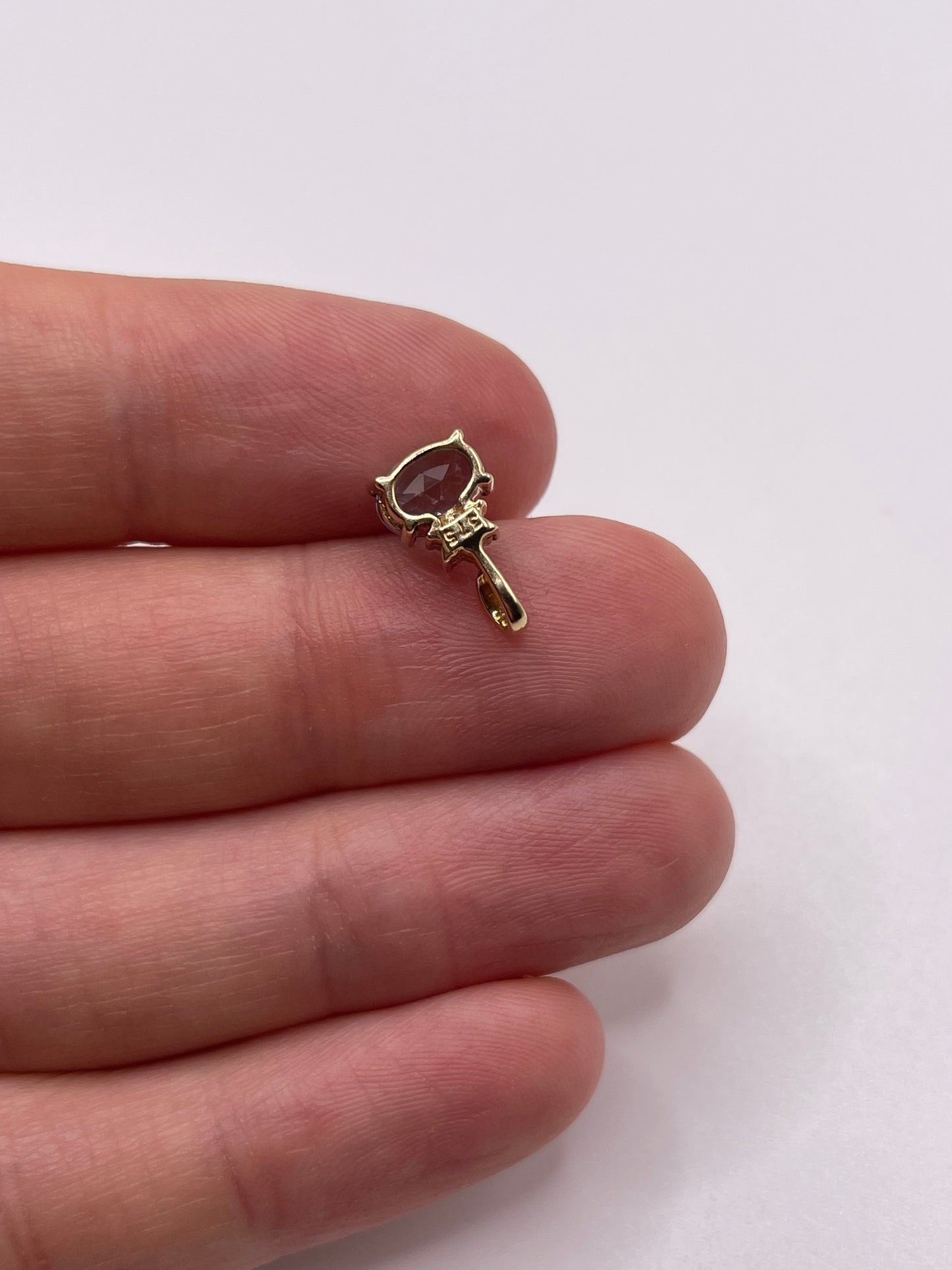 9ct gold topaz and diamond pendant