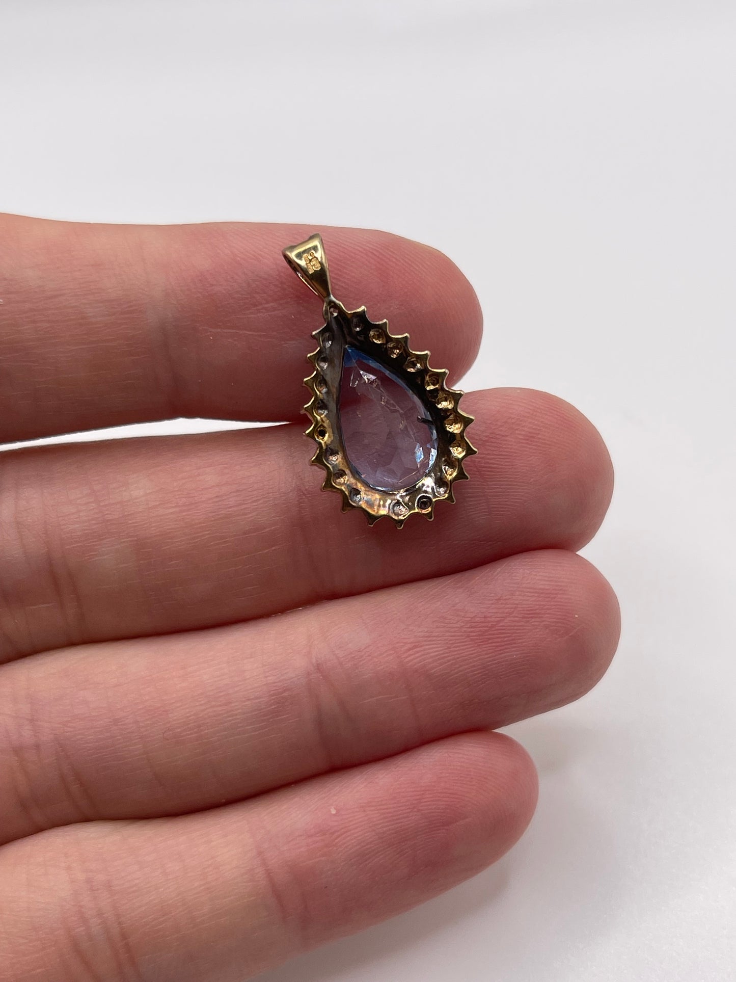 9ct gold topaz and diamond pendant