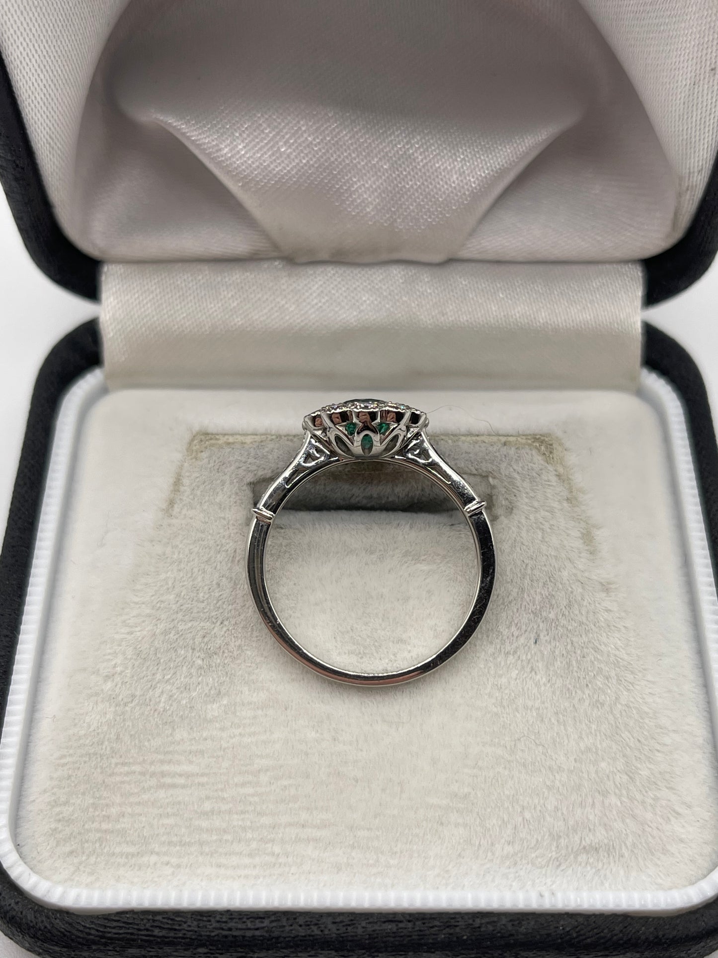 Platinum emerald and diamond ring