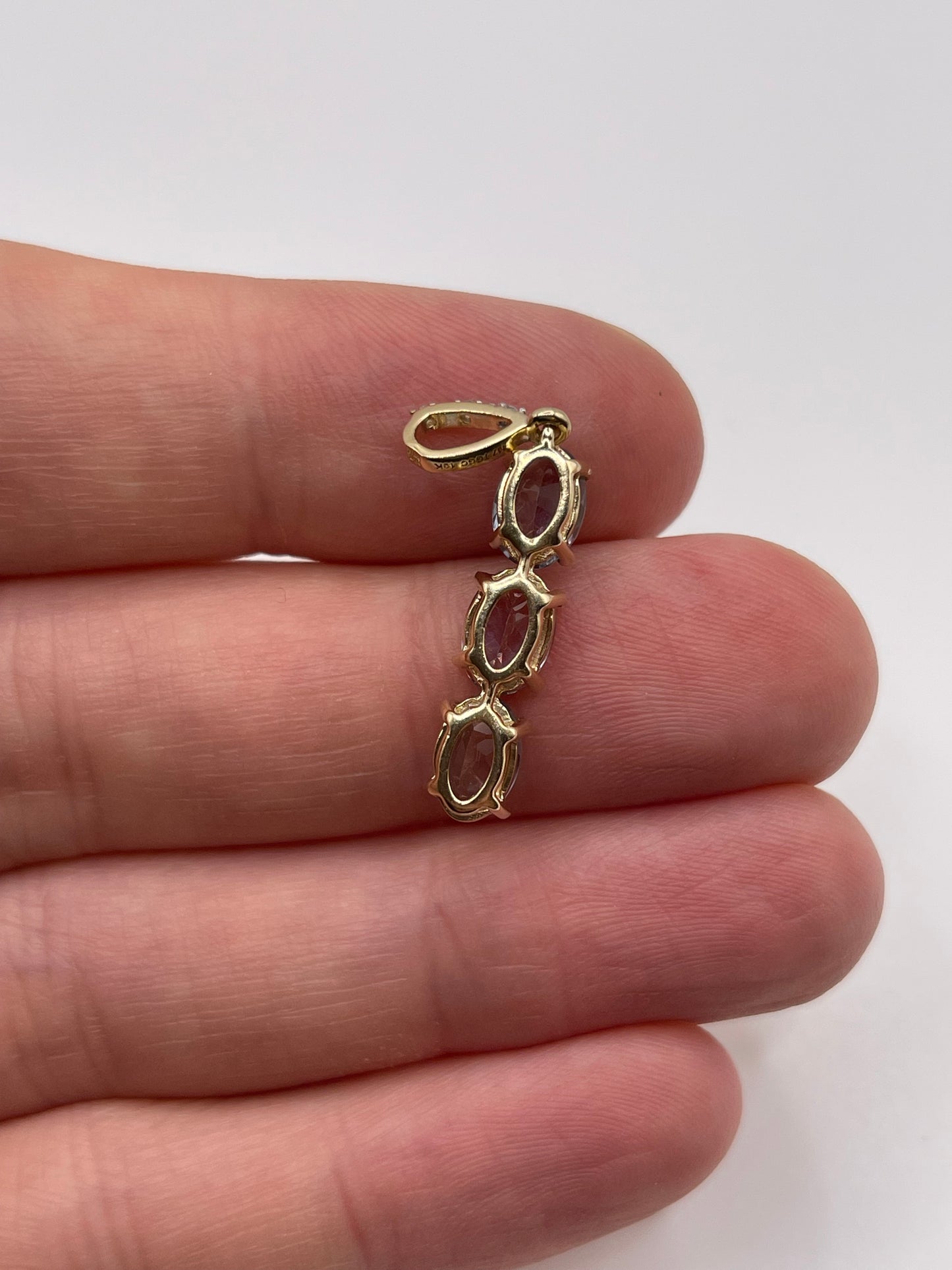 9ct gold tanzanite and diamond pendant