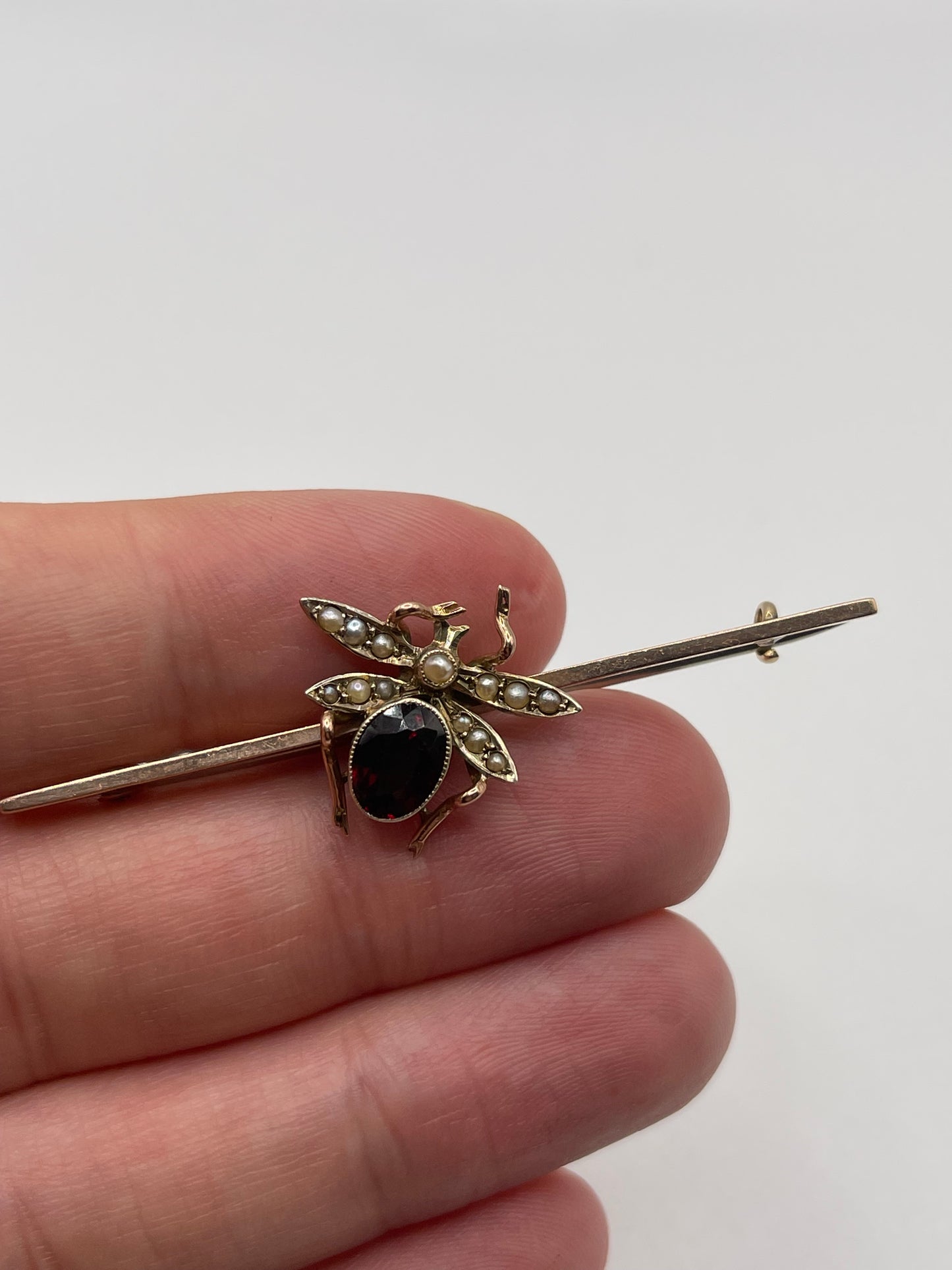 Antique 9ct rose gold garnet and pearl insect brooch