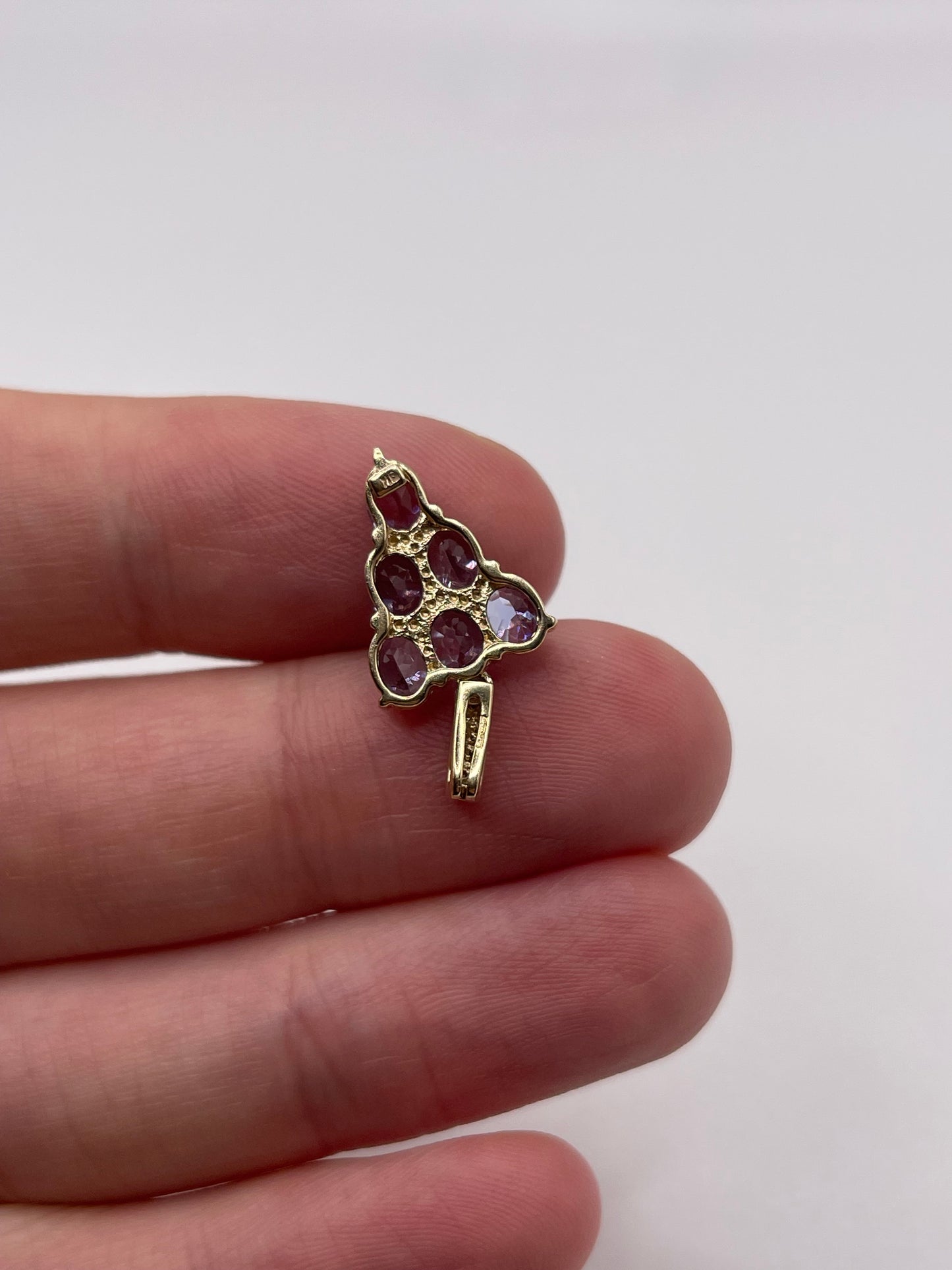 9ct gold tanzanite and diamond pendant