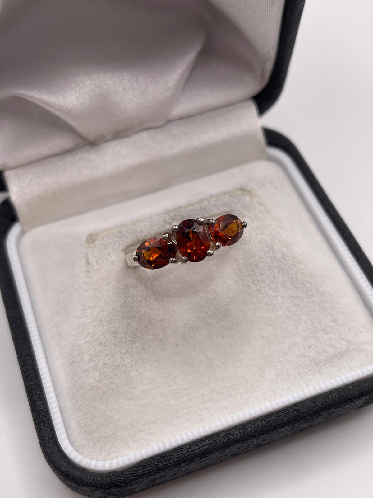 Silver topaz ring