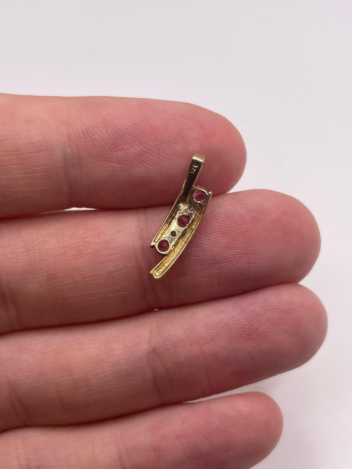 9ct gold pink topaz and diamond pendant