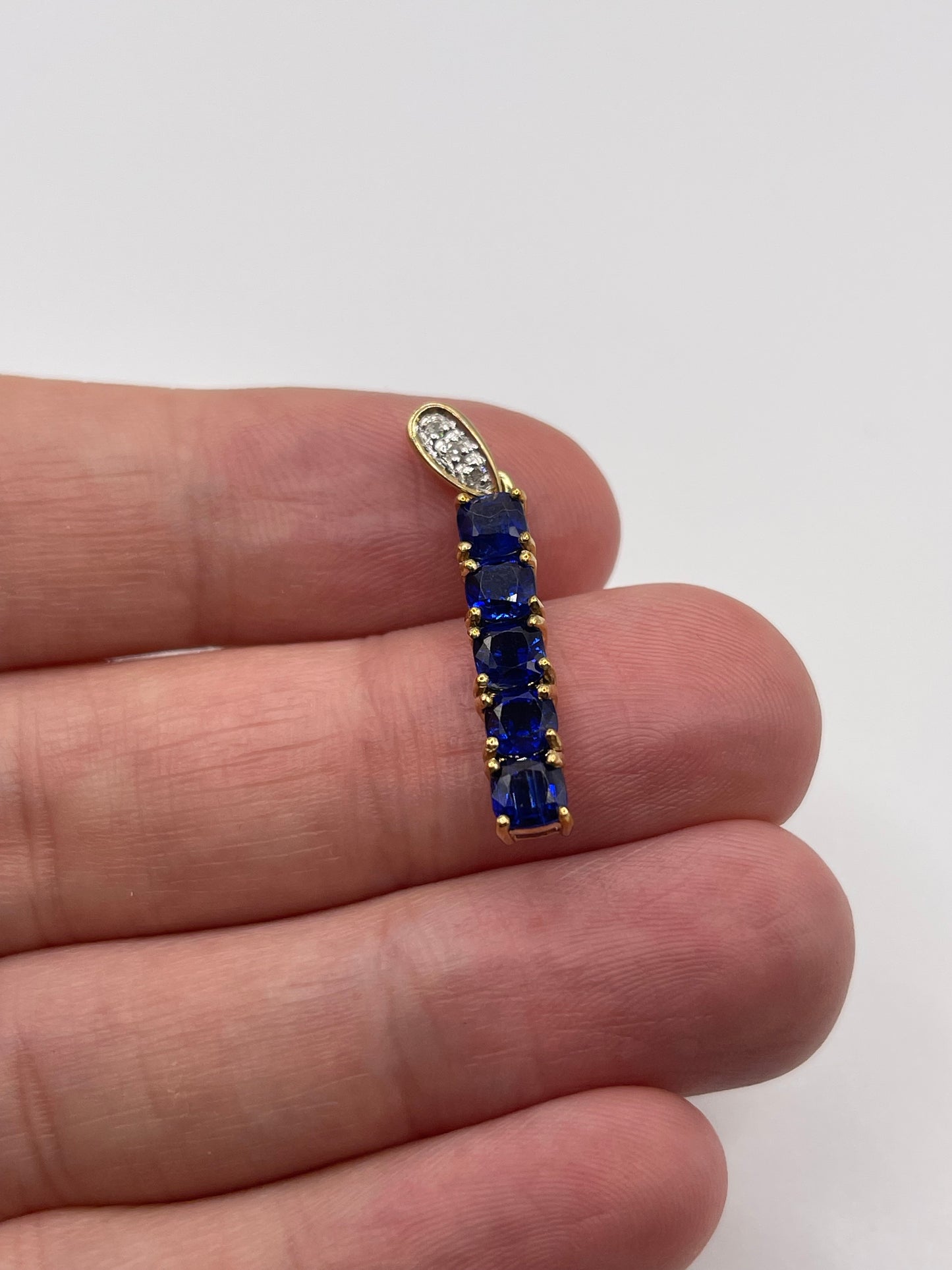 9ct gold kyanite and diamond pendant