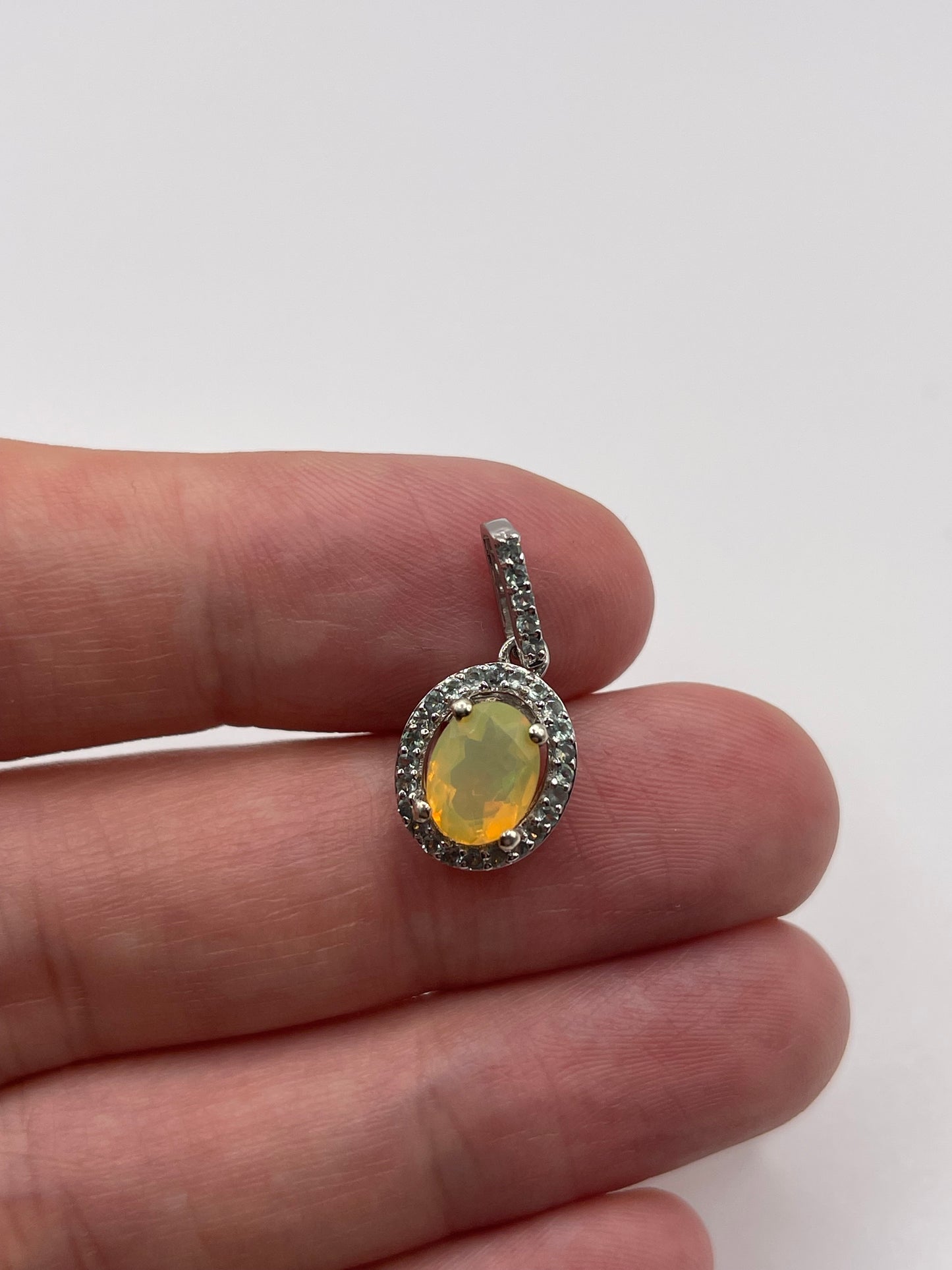 9ct white gold opal and alexandrite pendant