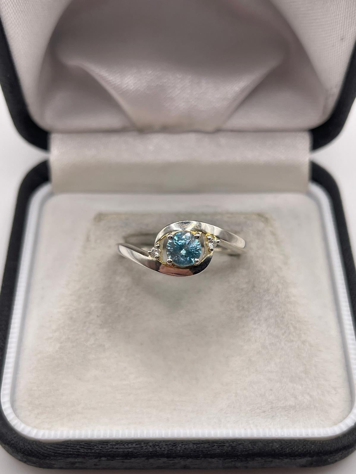 Silver topaz ring