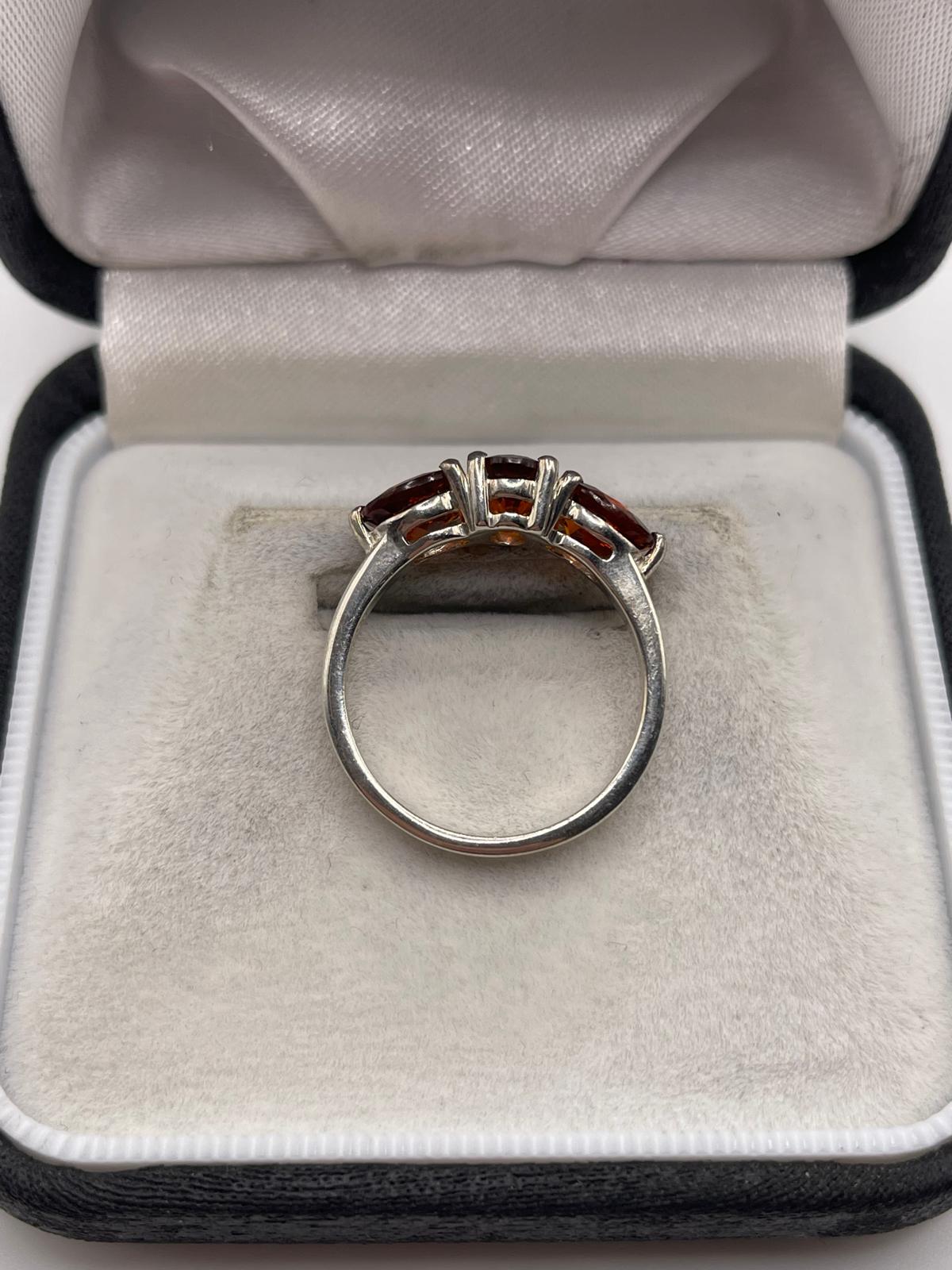 Silver topaz ring