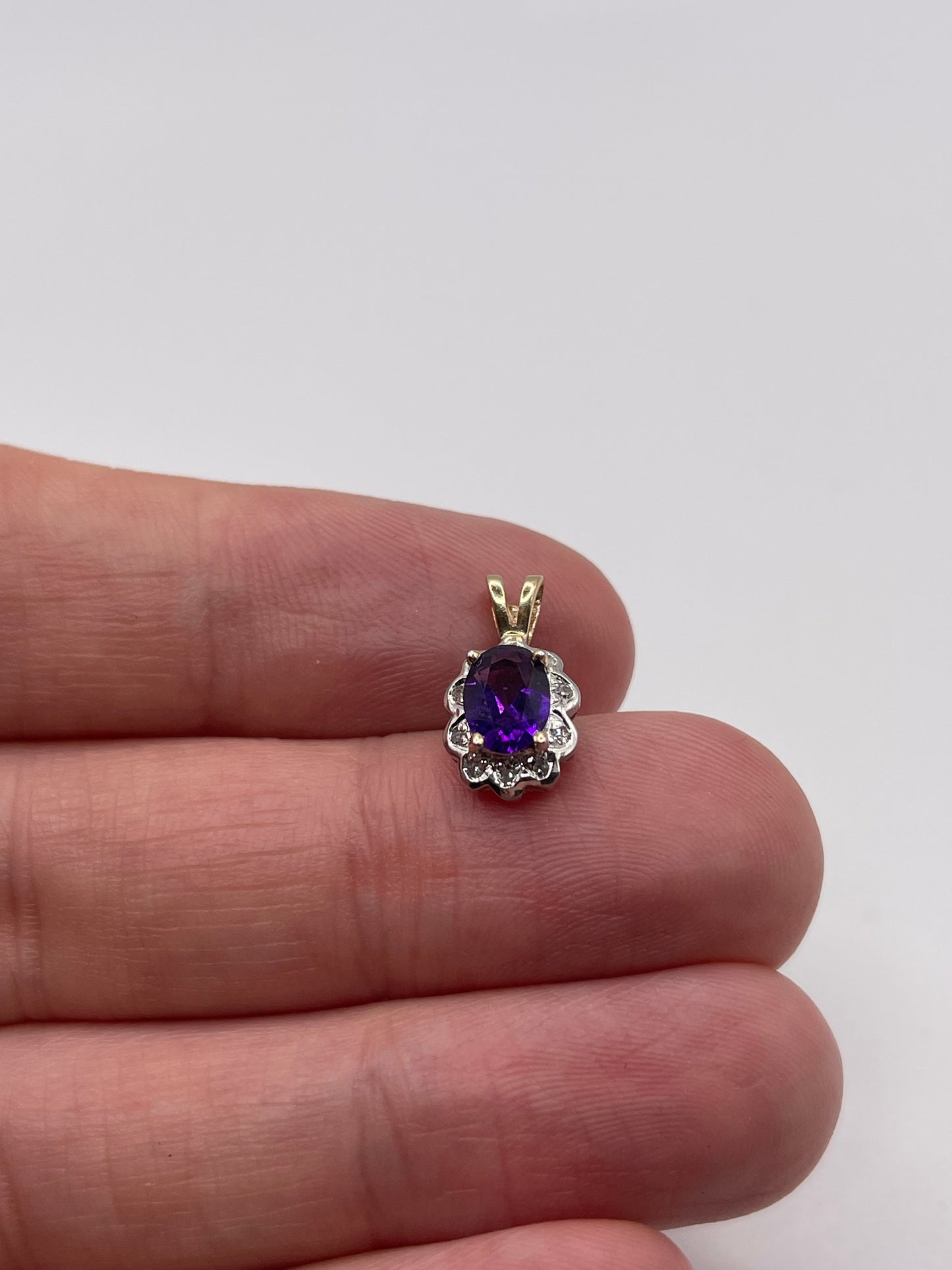 9ct gold amethyst and diamond pendant