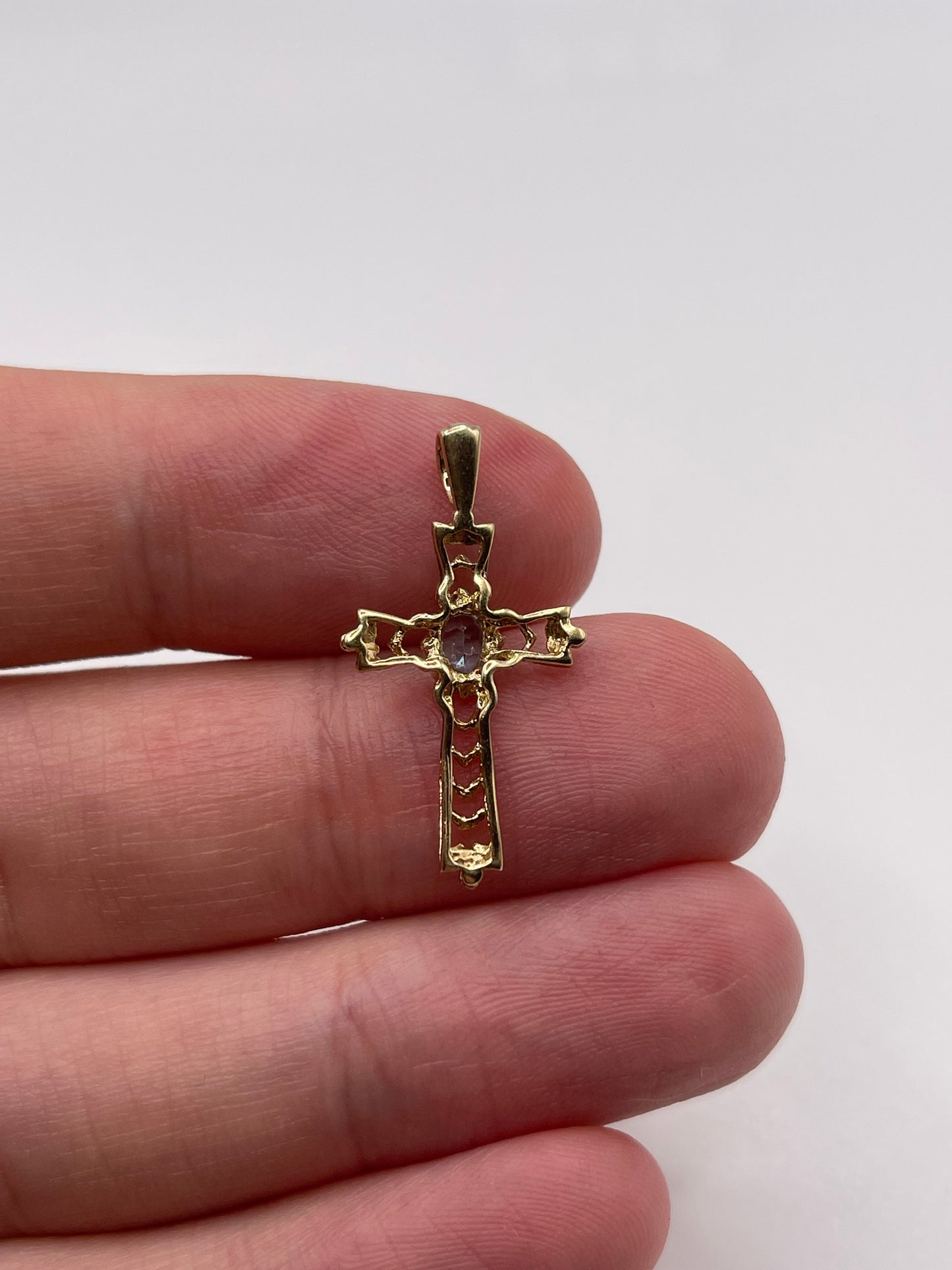 9ct gold blue topaz cross pendant