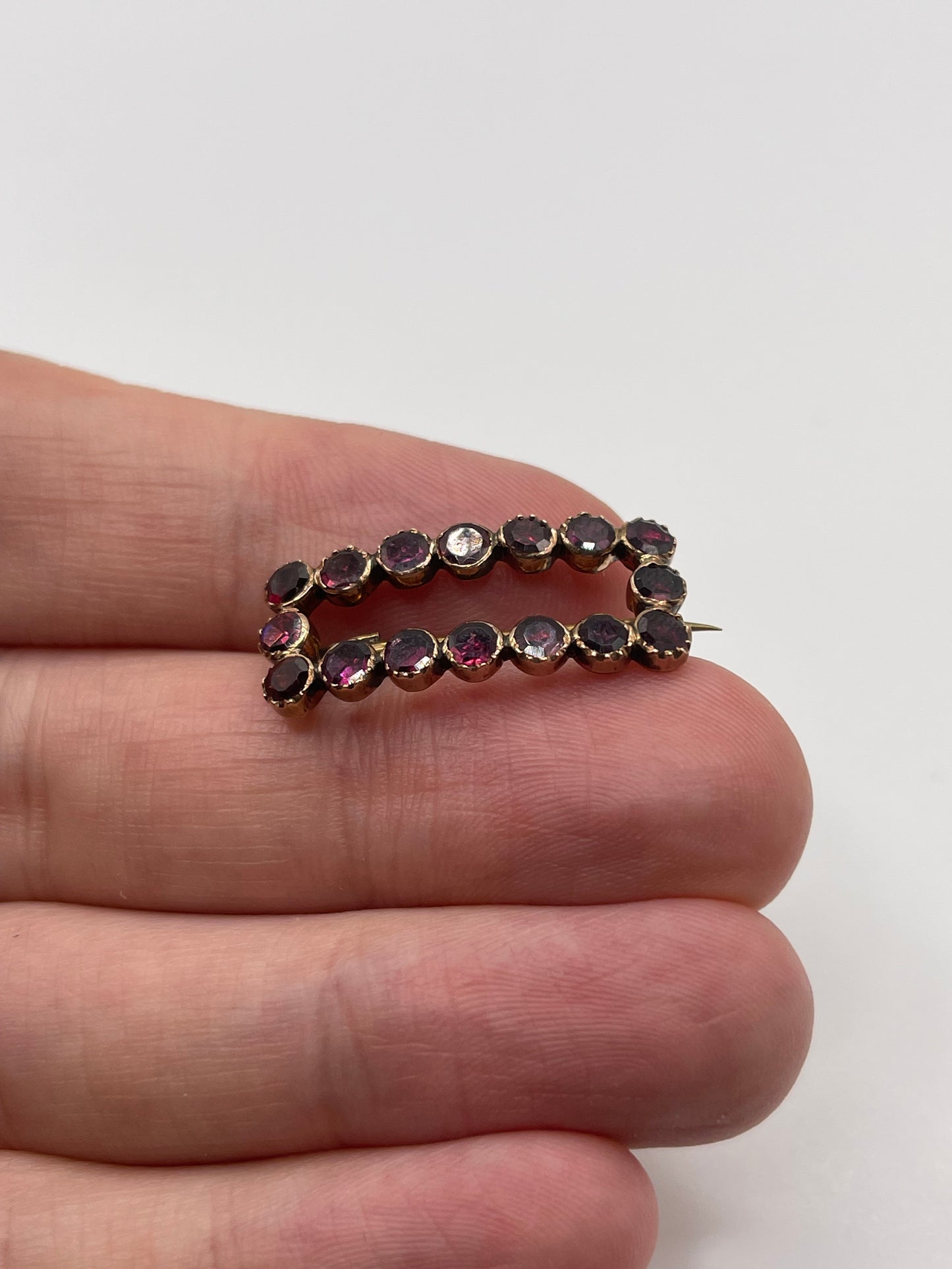 Antique 9ct rose gold garnet brooch