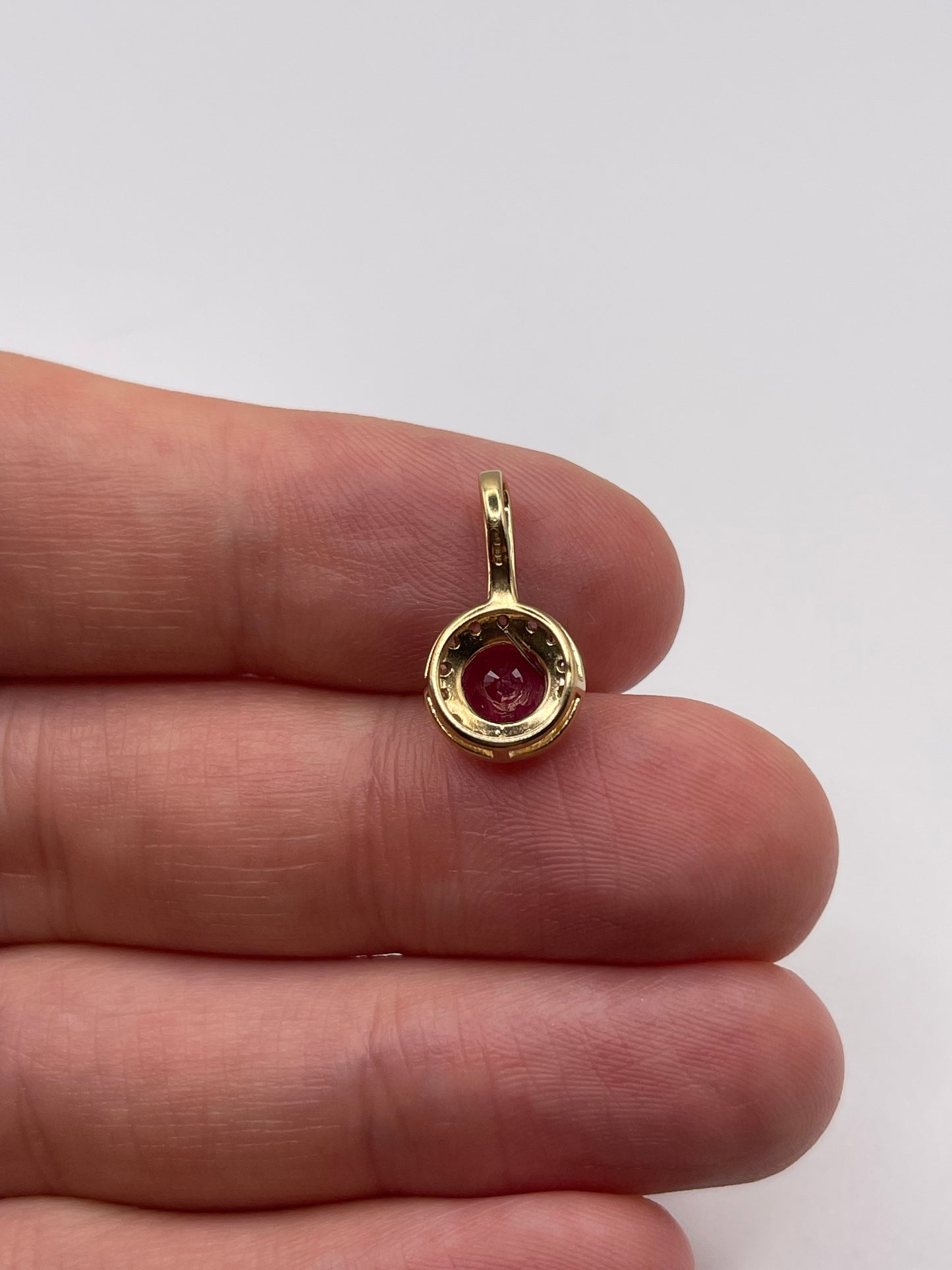 9ct gold ruby and zircon pendant