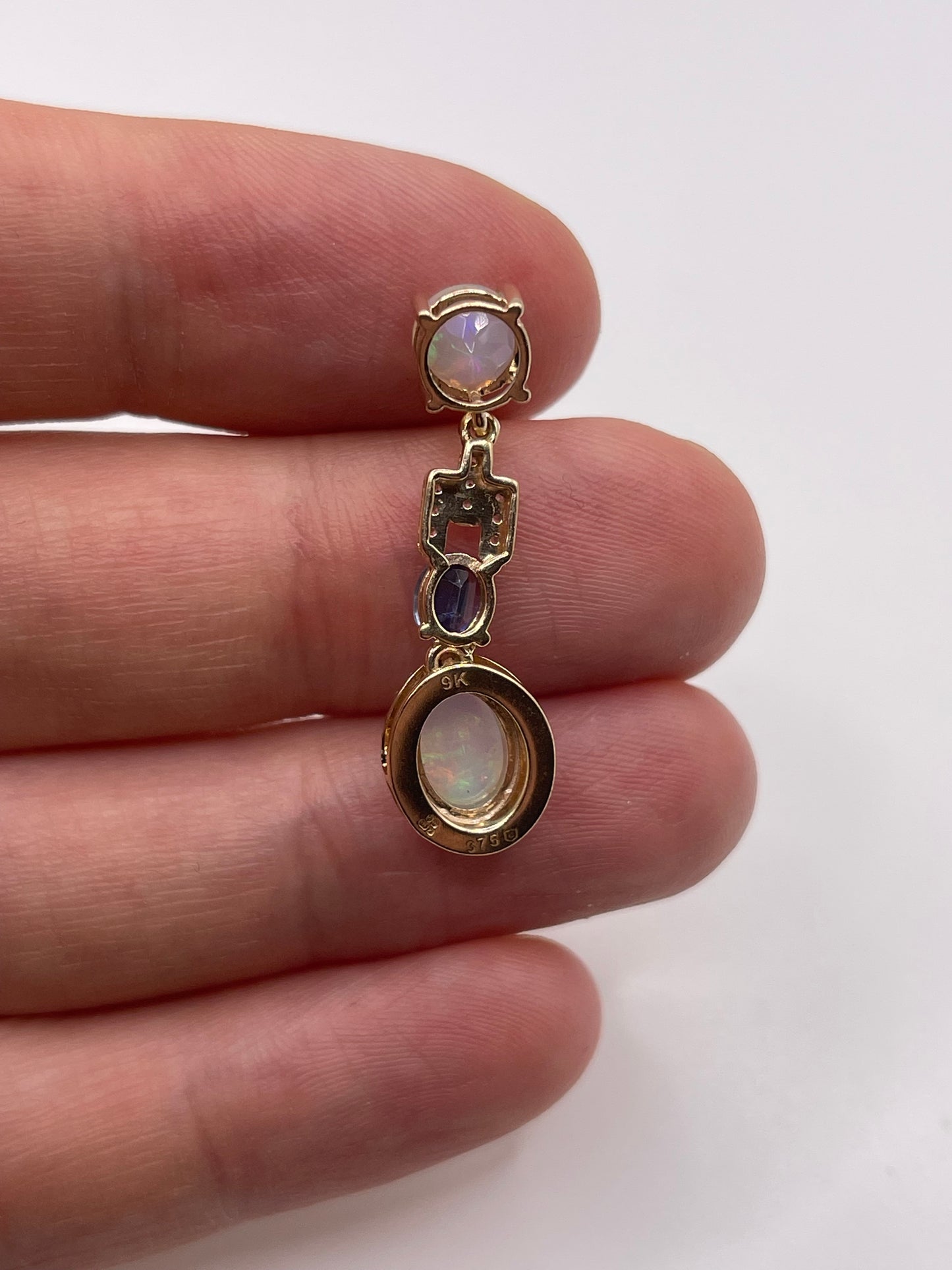 9ct gold opal, kyanite and zircon pendant
