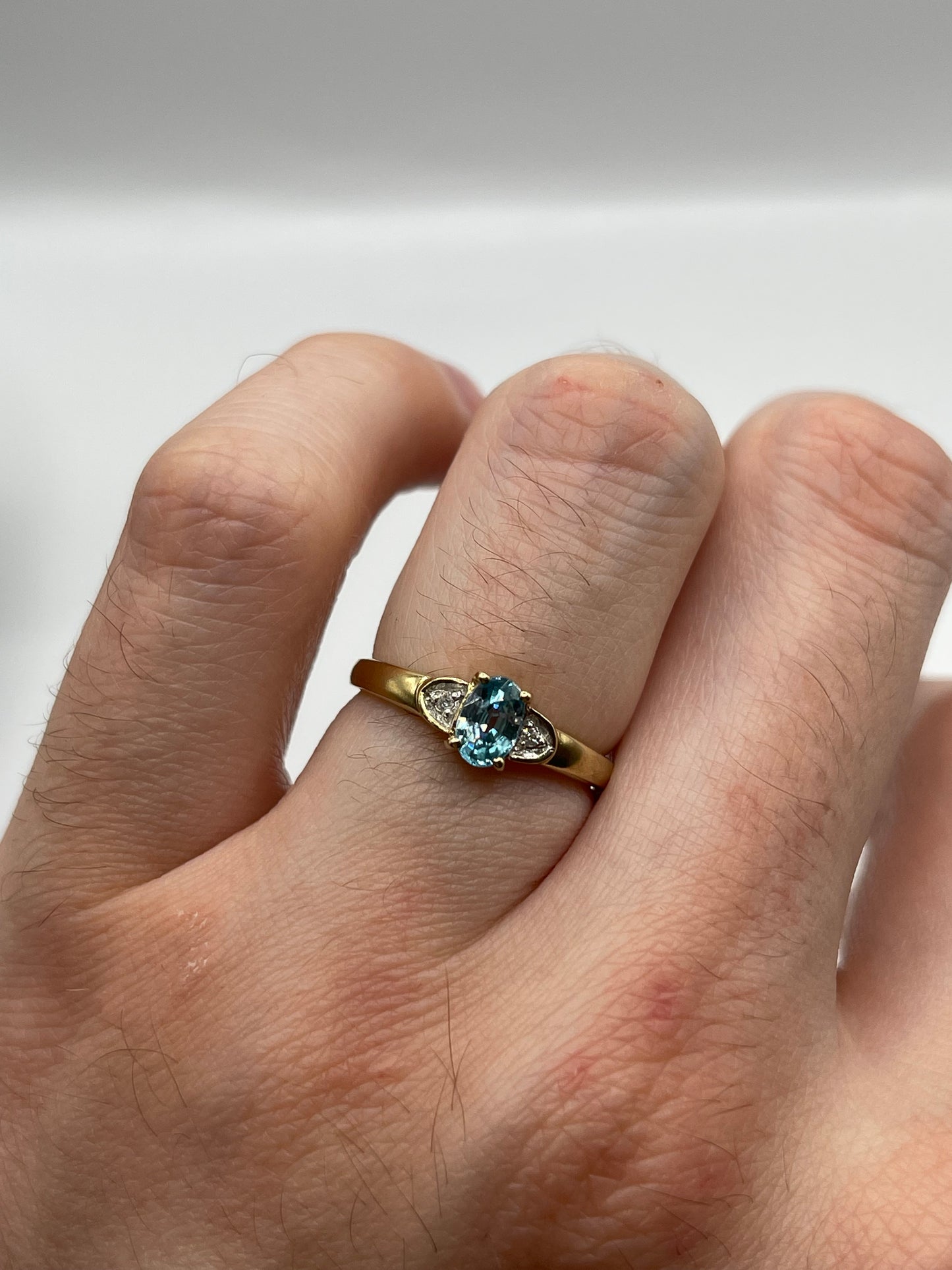 9ct gold blue zircon and diamond ring