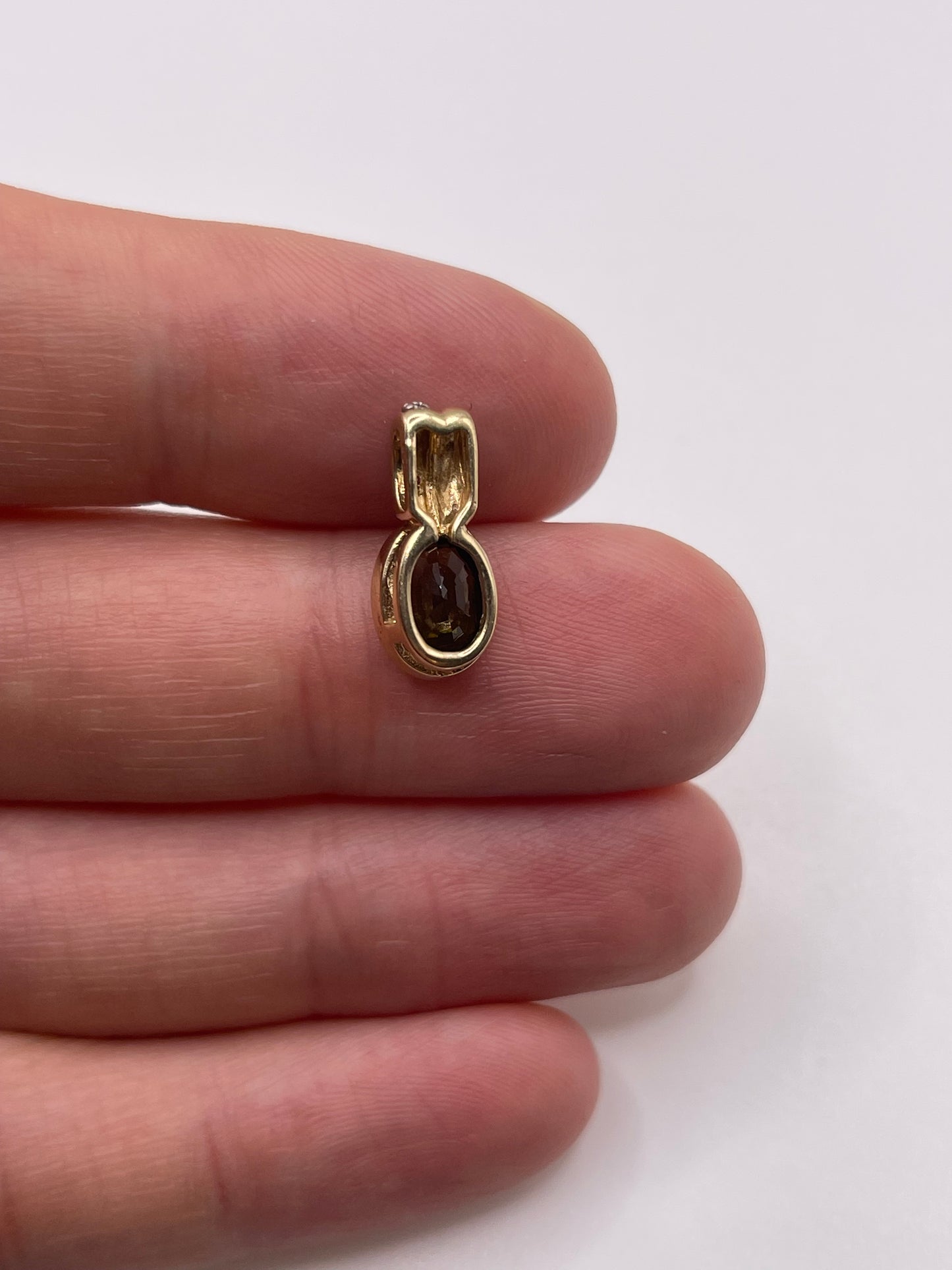 9ct gold tourmaline and zircon pendant