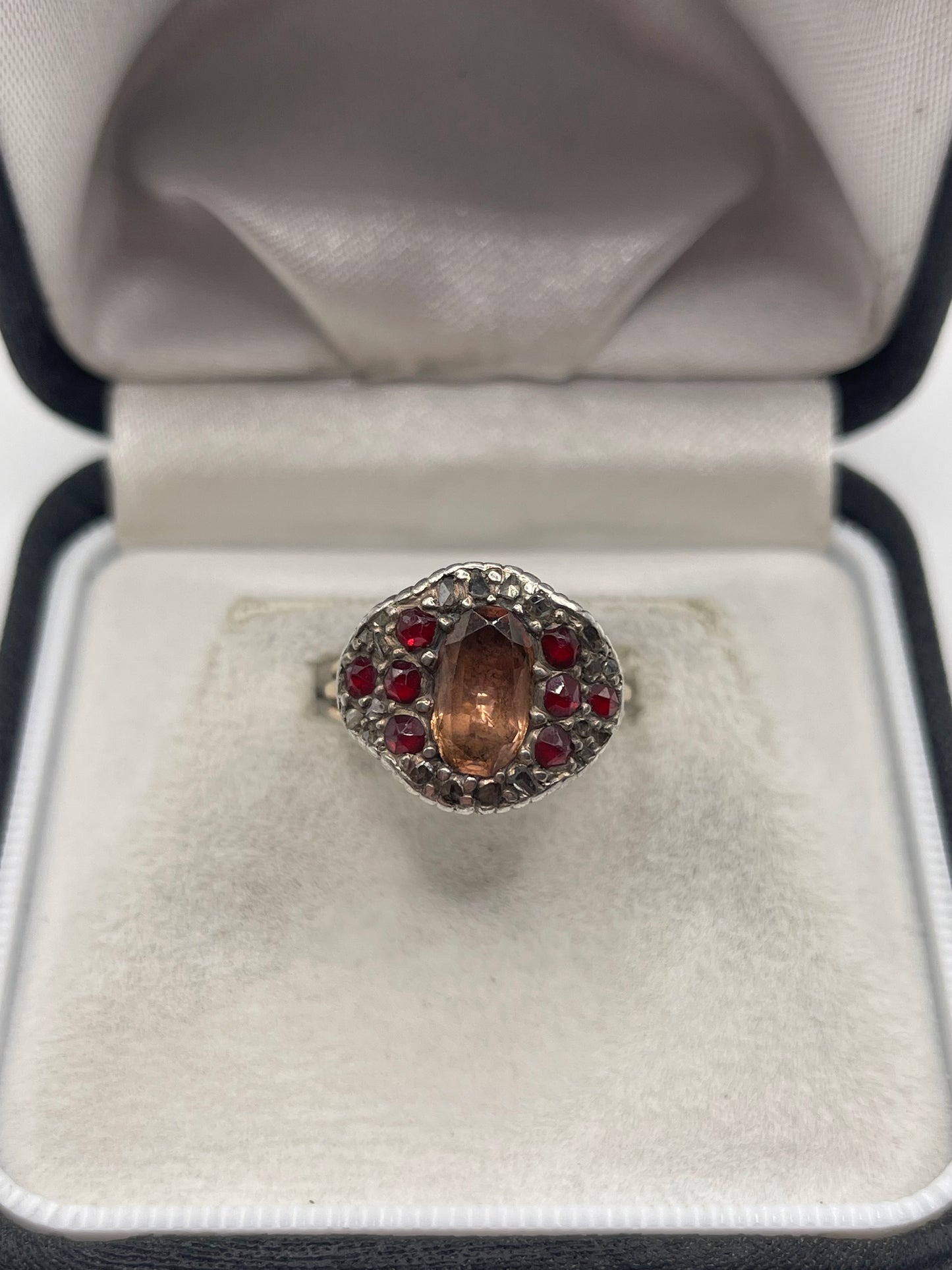 9ct gold and silver topaz, garnet and diamond ring