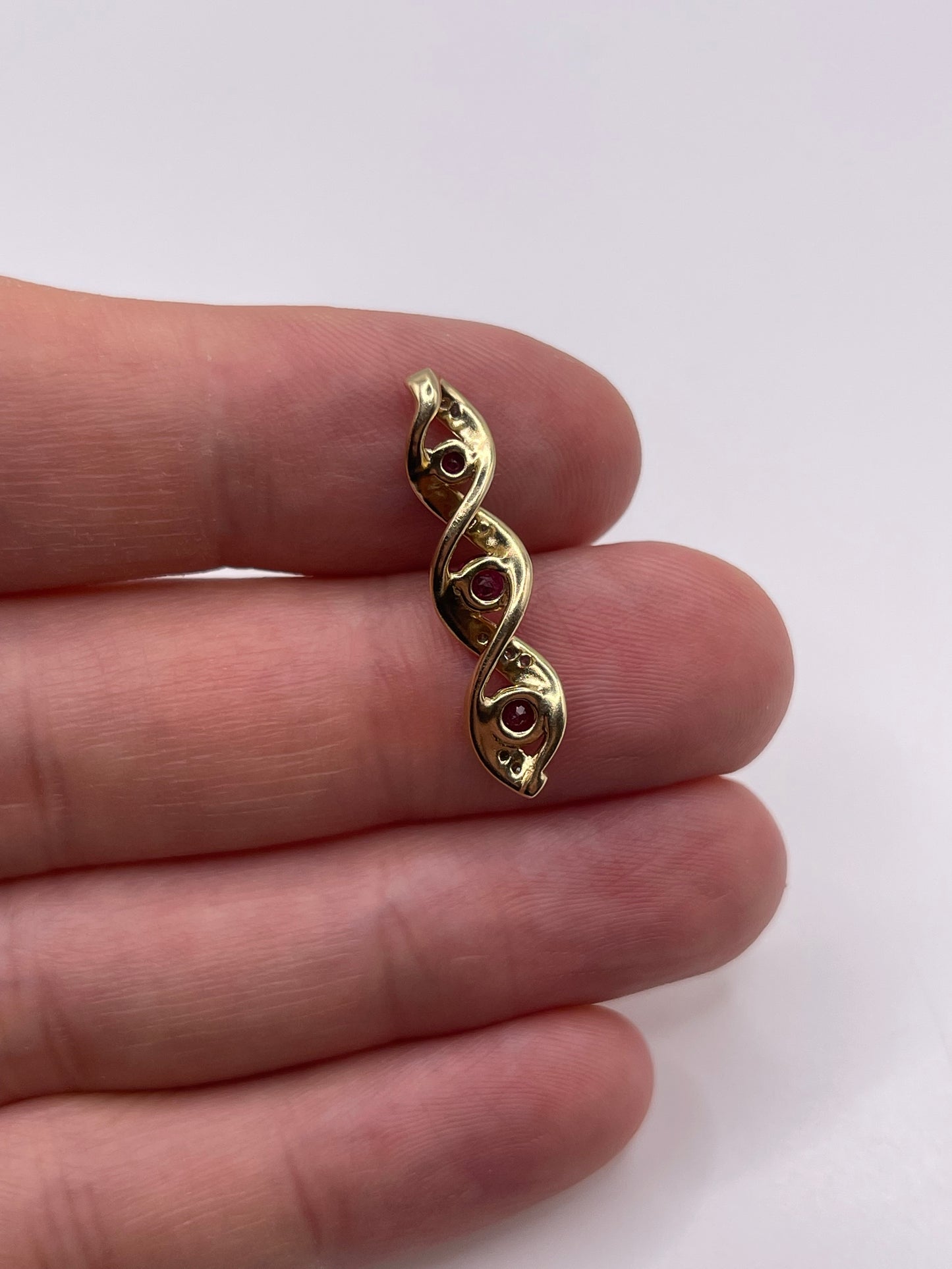 9ct gold ruby and diamond pendant