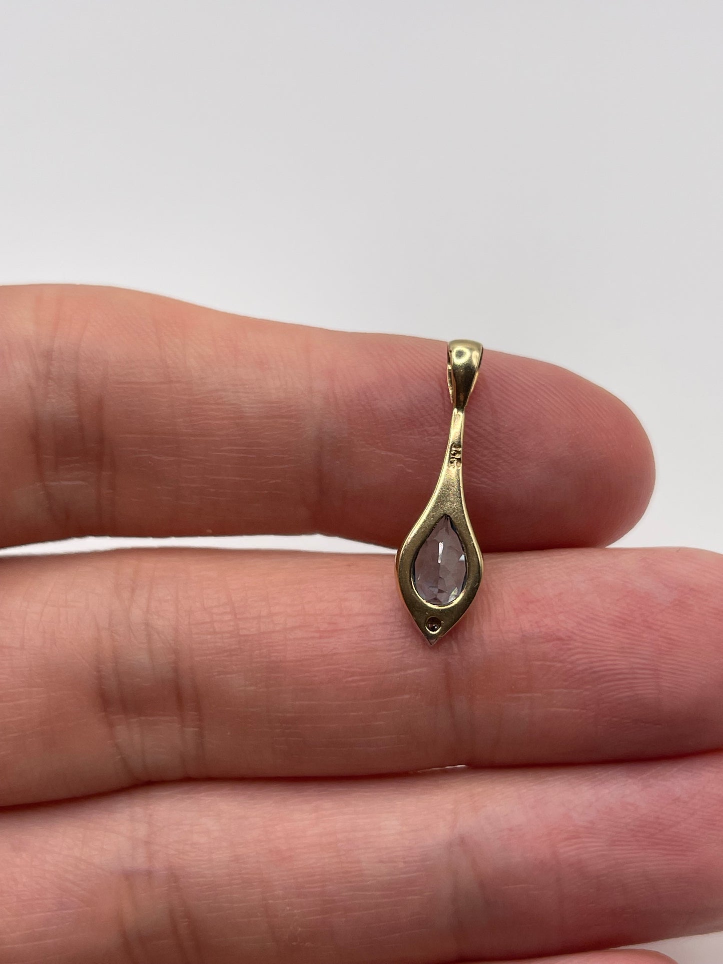 9ct gold topaz and diamond pendant