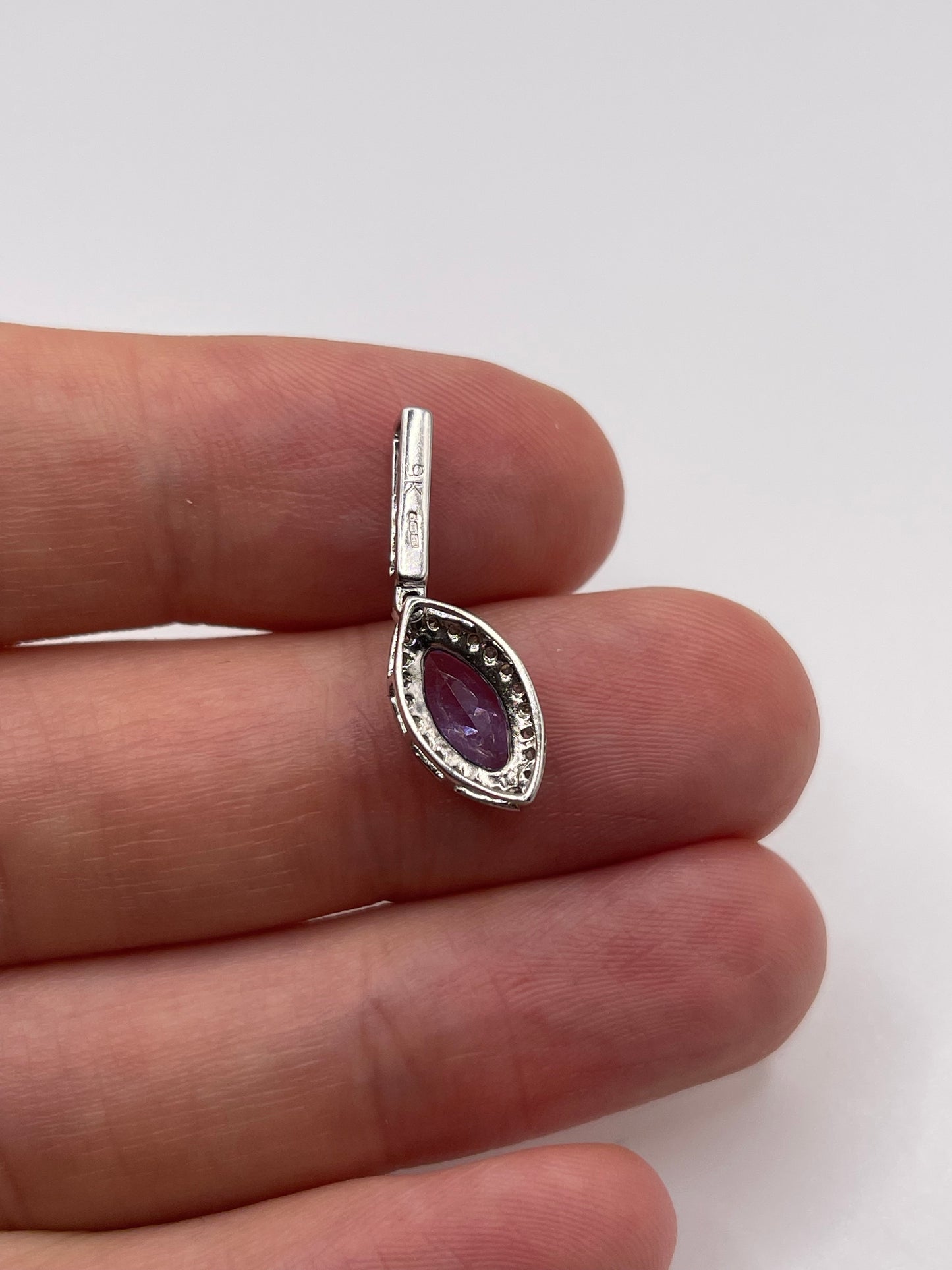 9ct white gold tanzanite and diamond pendant