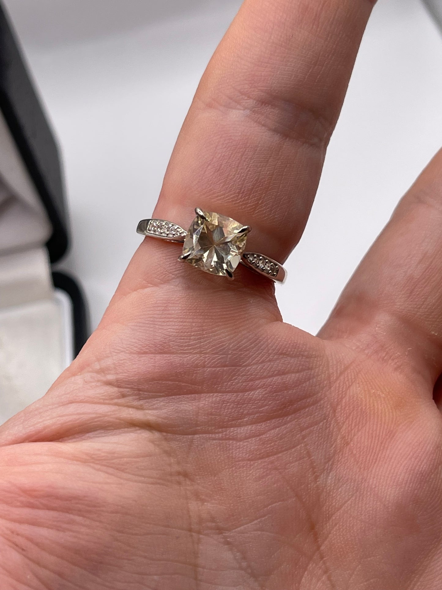 Silver topaz and zircon ring