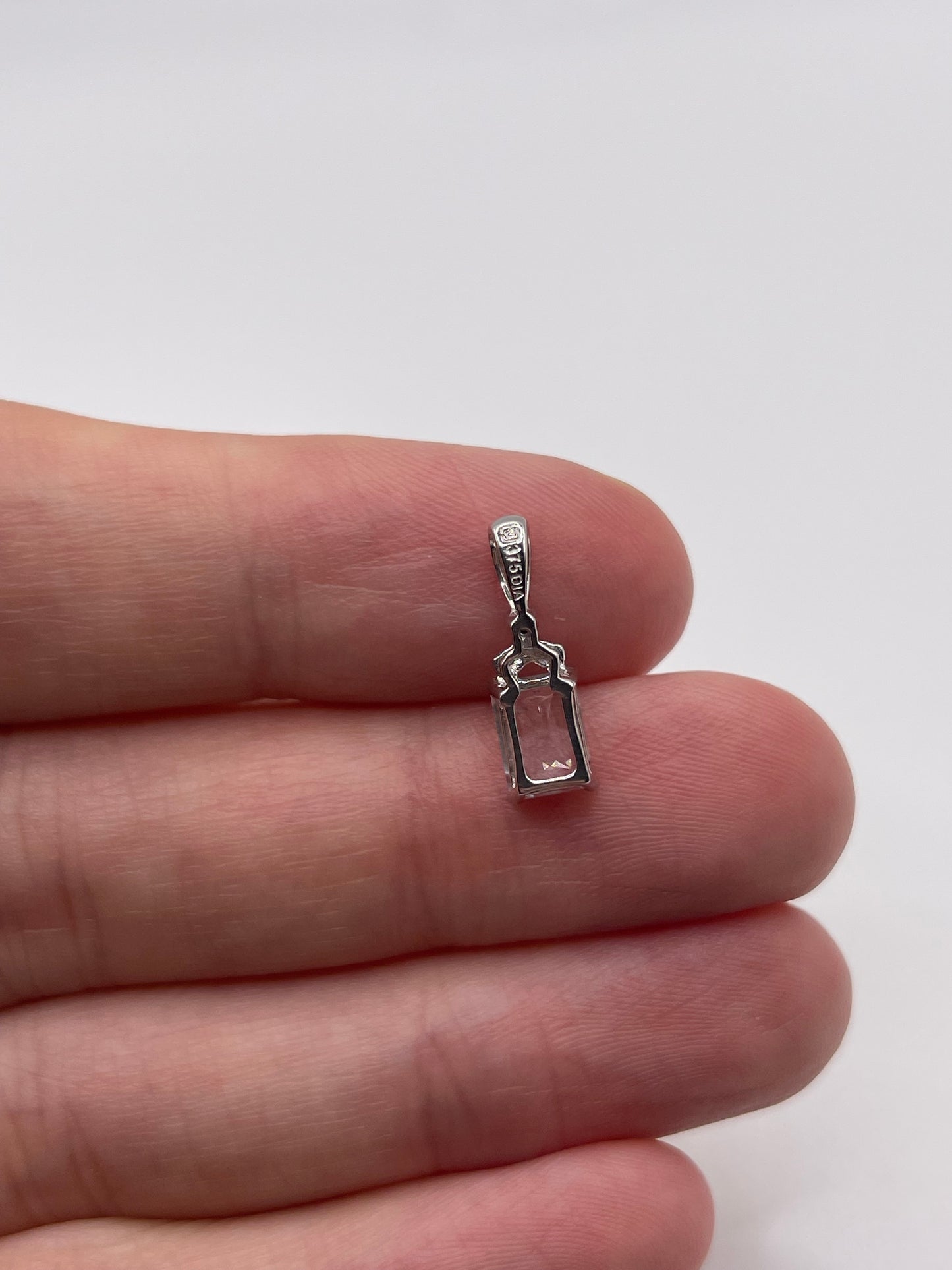 9ct white gold aquamarine and diamond pendant