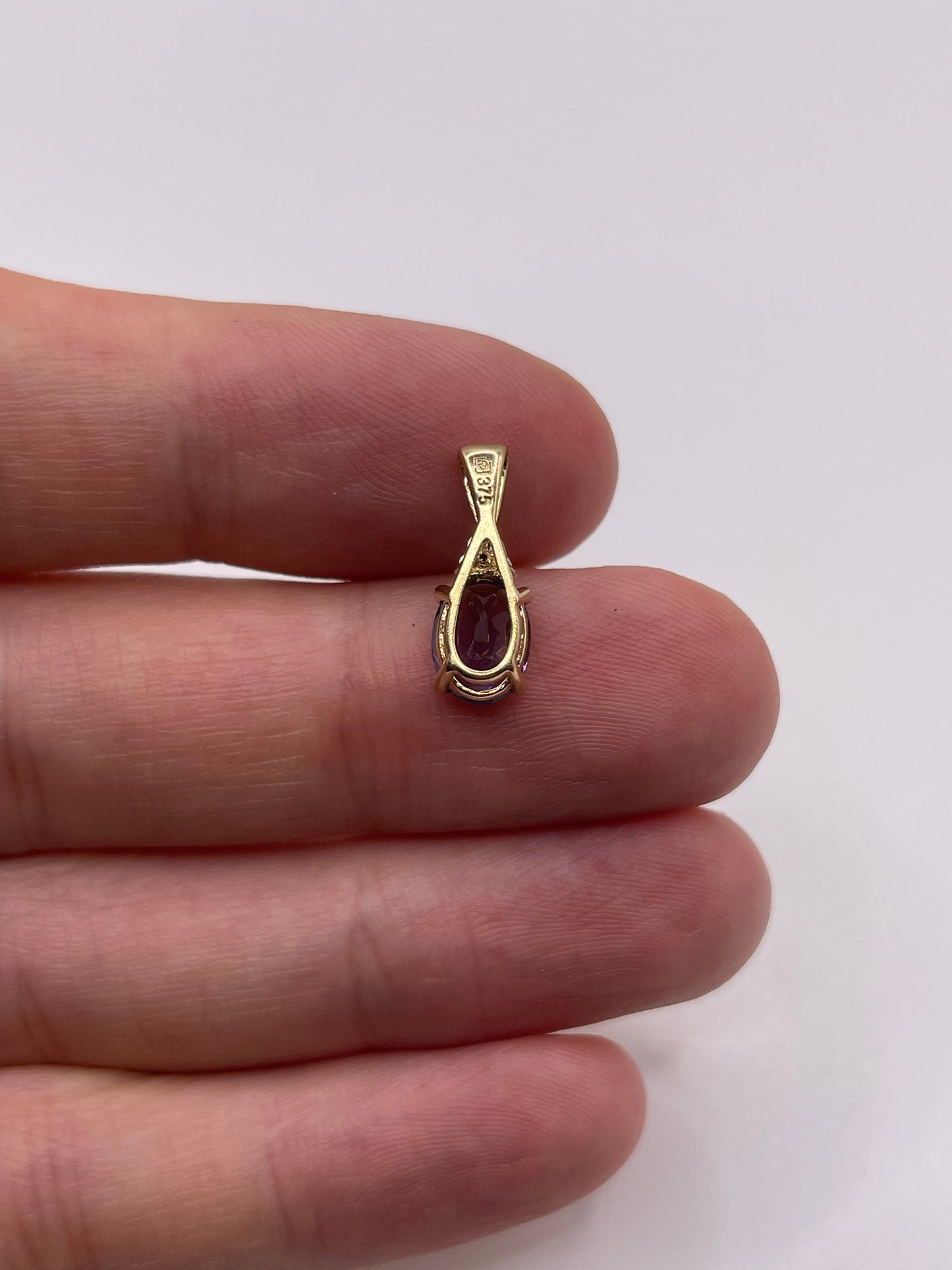 9ct gold iolite and diamond pendant