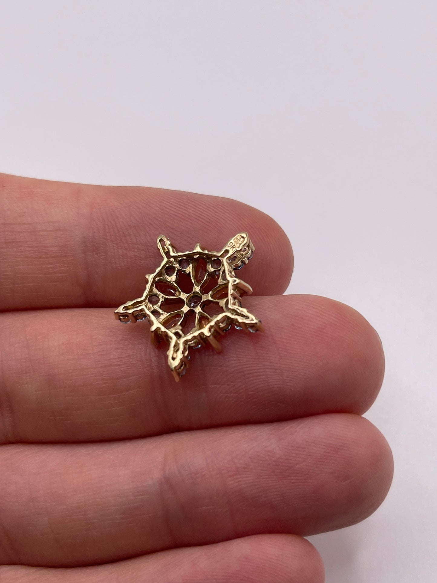 9ct gold topaz and orange sapphire pendant