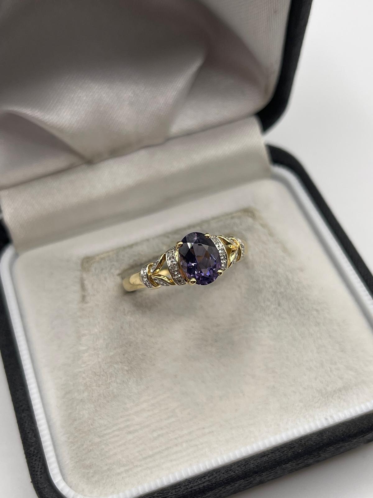 9ct gold iolite and diamond ring