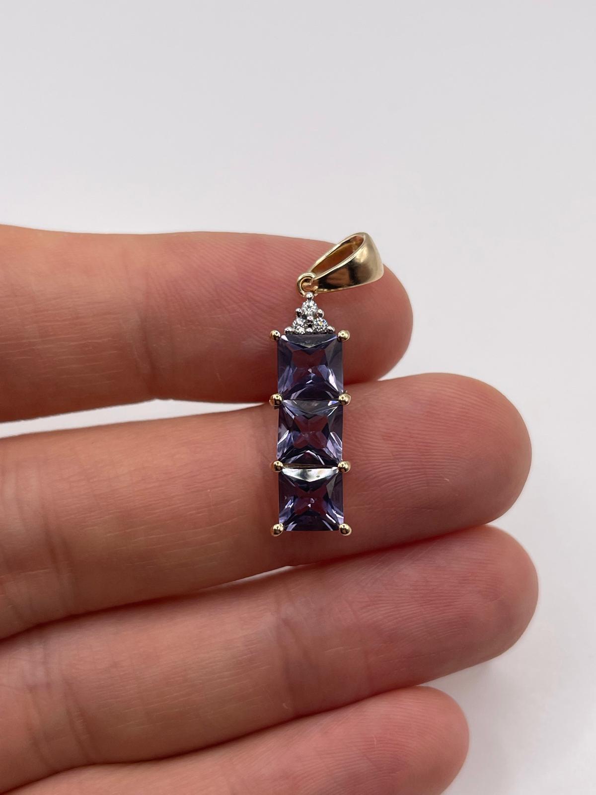 9ct gold iolite and zircon pendant
