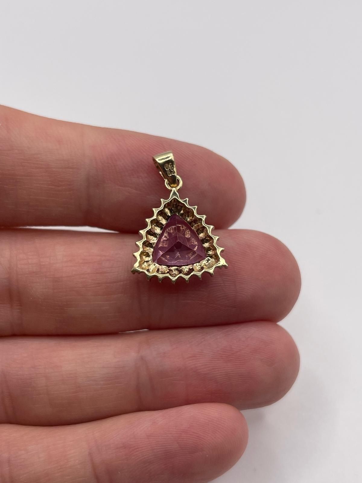 9ct gold topaz and diamond pendant