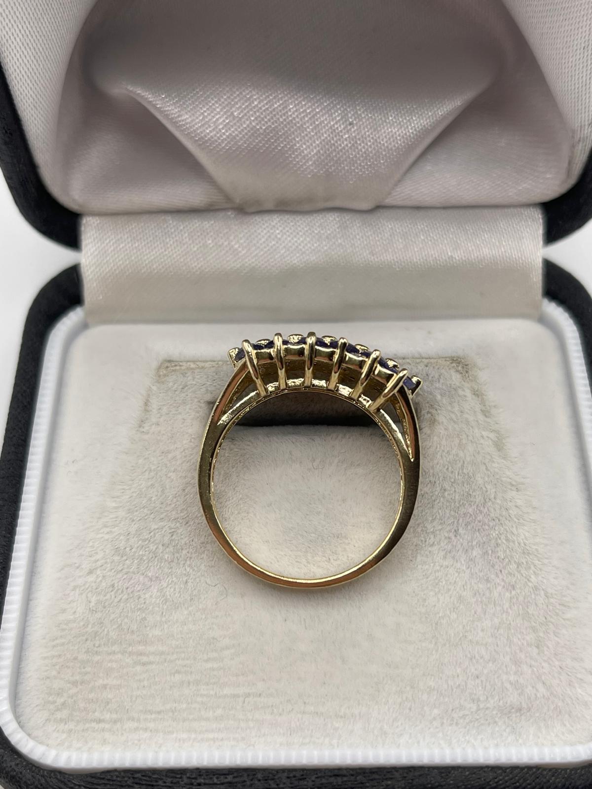 9ct gold tanzanite and diamond ring
