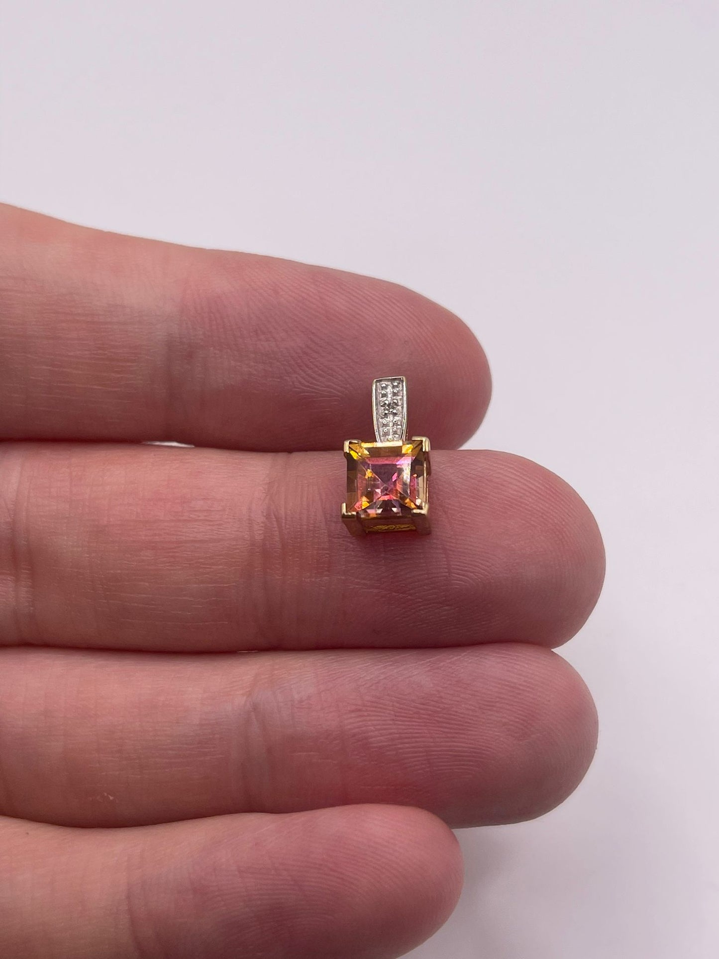 9ct gold topaz and diamond pendant