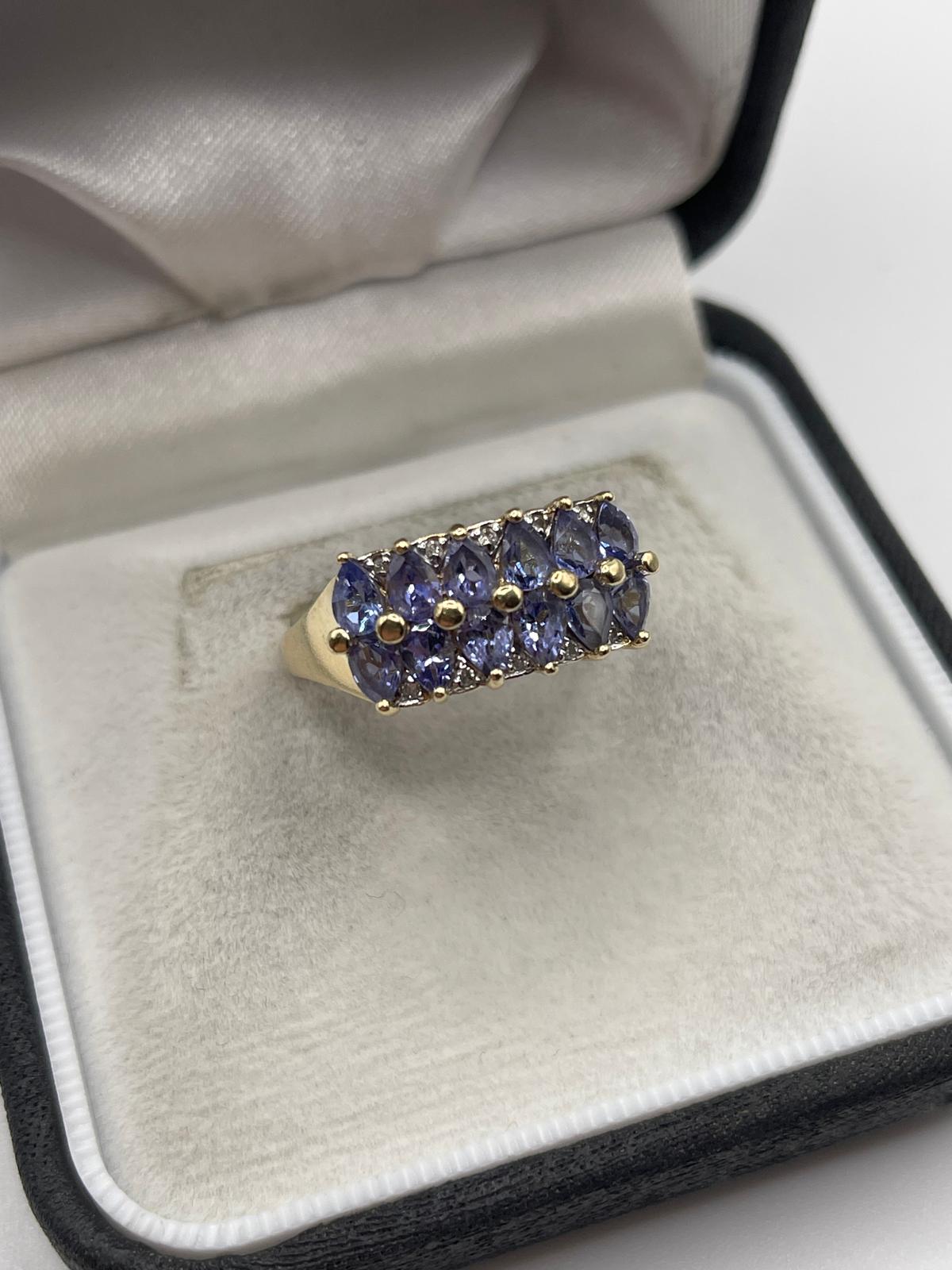 9ct gold tanzanite and diamond ring
