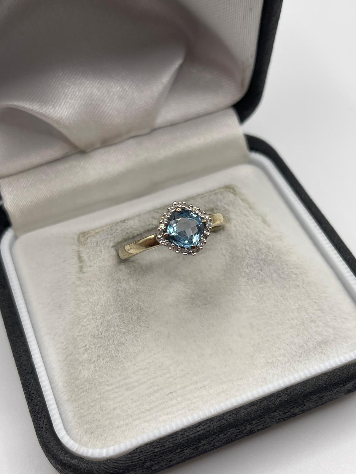 9ct gold topaz and diamond ring