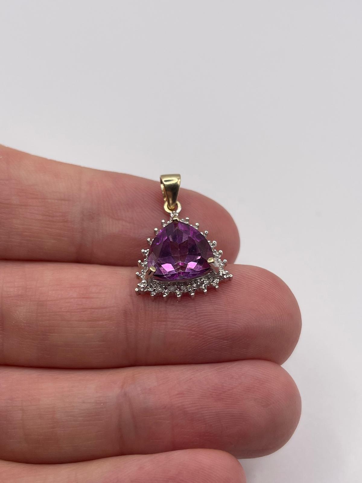 9ct gold topaz and diamond pendant