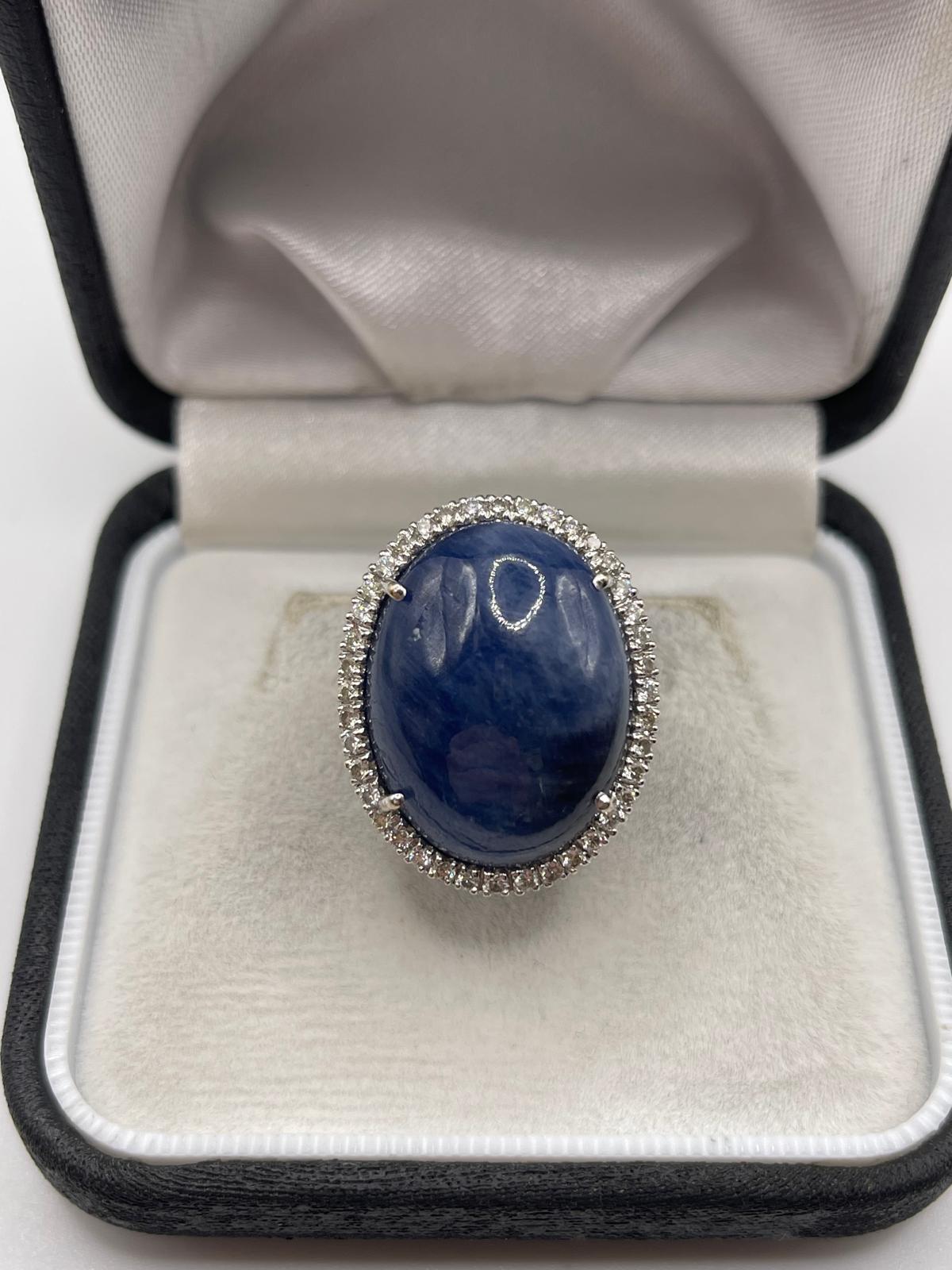 18ct white gold cabachon sapphire and diamond ring